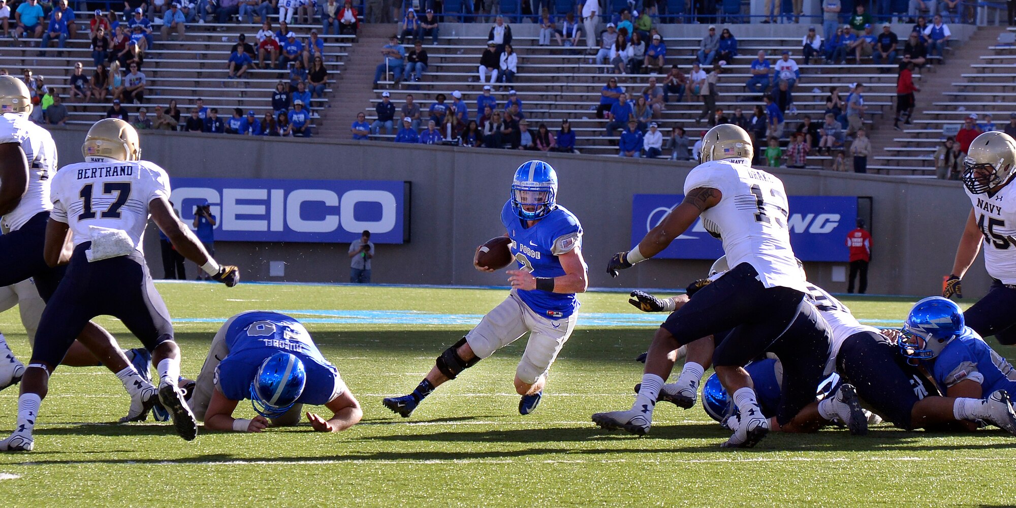 Falcon Quarterback Kale Pearson sprints with the ball against Navy Oct. 4 at Falcon Stadium. Air Force beat Navy 30-21. The win puts the Falcons one win away from the Commander-in-Chief's Trophy. (U.S. Air Force photo/Jason Gutierrez)