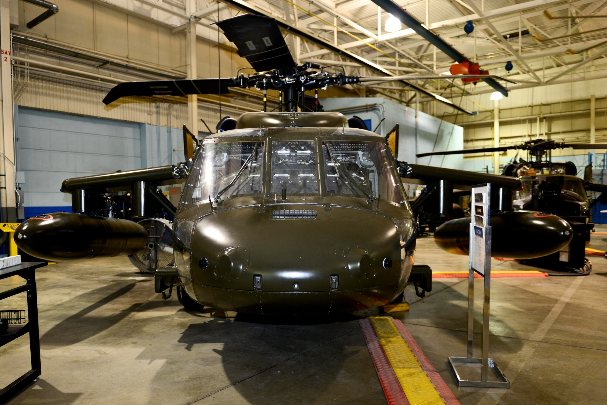 The 128th Aviation Brigade will utilize their new training aid, formally the Super 62 “Black widow” a Blackhawk helicopter that was used during a mission in Operation Gothic Serpent Oct. 3, 1993 for the Advanced Individual Training students training to become Blackhawk avionic mechanics at Fort Eustis, Va., Oct. 2, 2014. The training aid will be controlled by the instructors to create issues within the aircraft for the students to fix. (U.S. Air Force photo by Airman 1st Class Kimberly Nagle/Released)