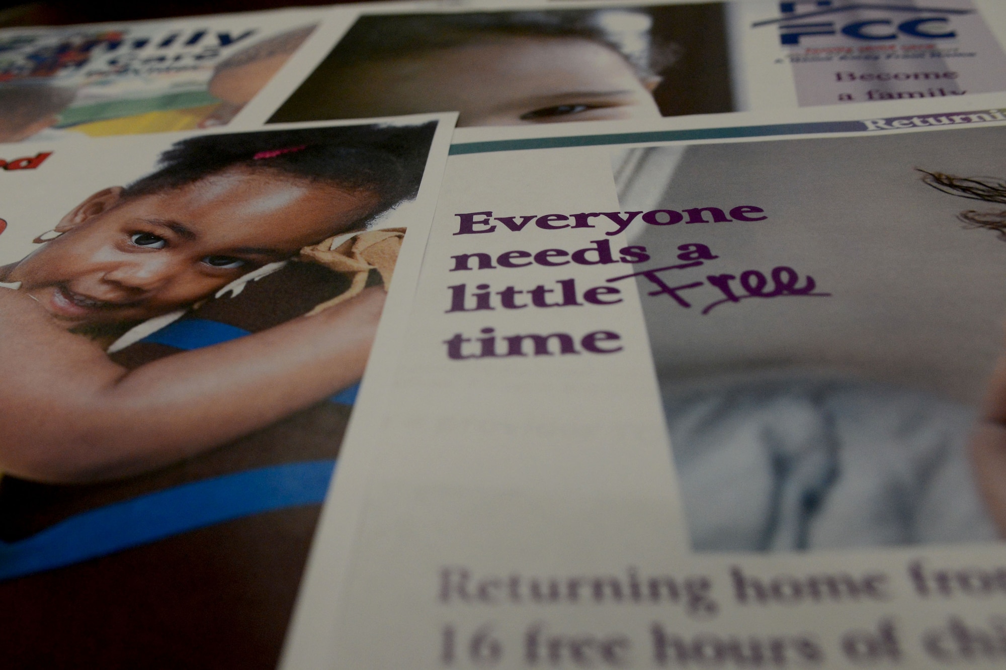 Brochures are displayed with the programs offered by the family child care office at Shaw Air Force Base, S.C., Oct. 3, 2014. Providers offer flexibility for parents who need extended child care hours. (U.S. Air Force photo by Senior Airman Ashley L. Gardner/Released)

