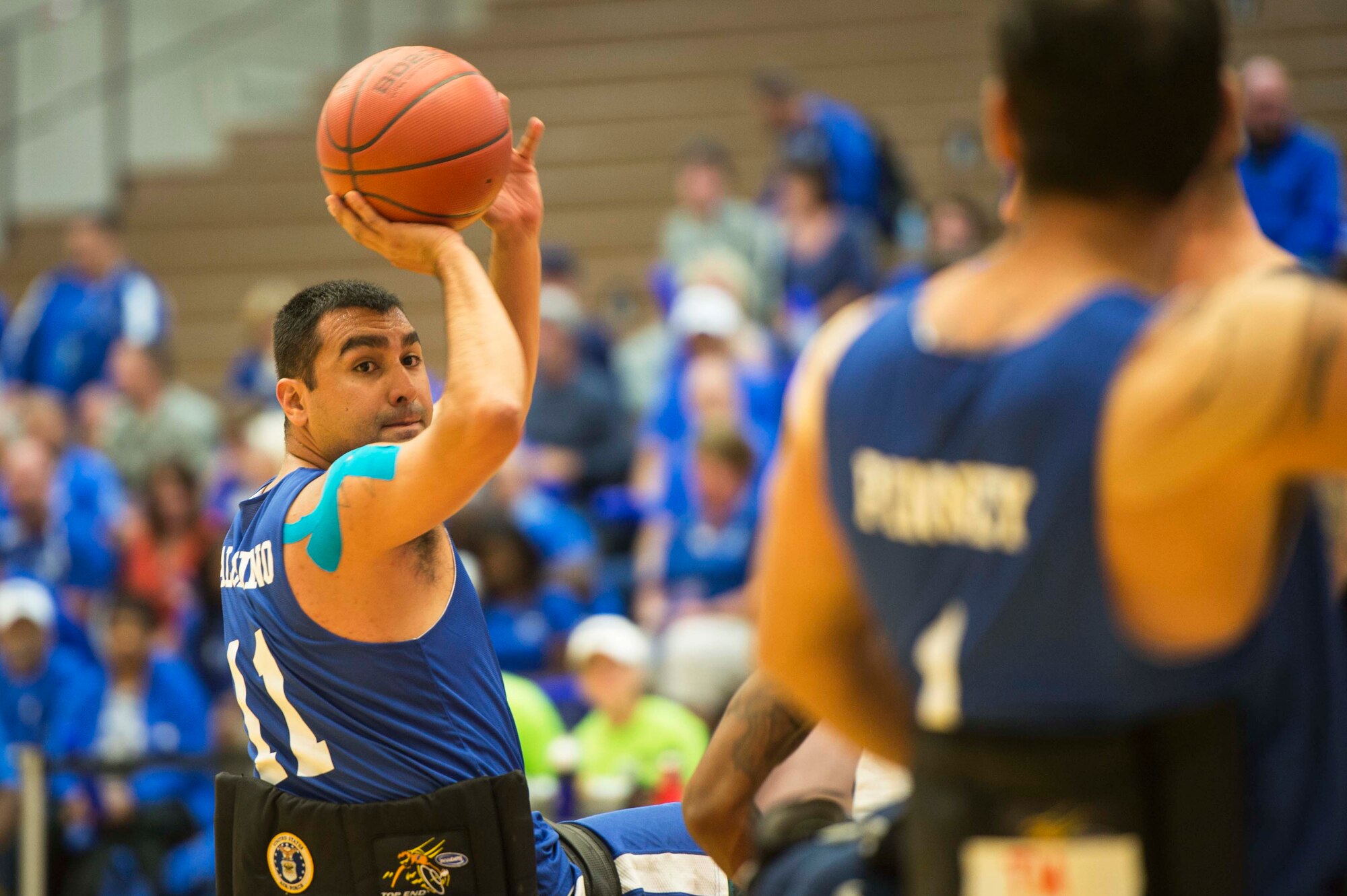 U.S. Air Force athlete Scott Palomino participates in wheelchair basketball during the 2014 Warrior Games, Colorado Springs, Colorado, Sept. 29, 2014. The Warrior Games consists of athletes from throughout the Department of Defense, who compete in paralympic style events for their respective military branch. The goal of the games is to help highlight the limitless potential of warriors through competitive sports. (U.S. Air Force photo/Staff Sgt. Stephany Richards)