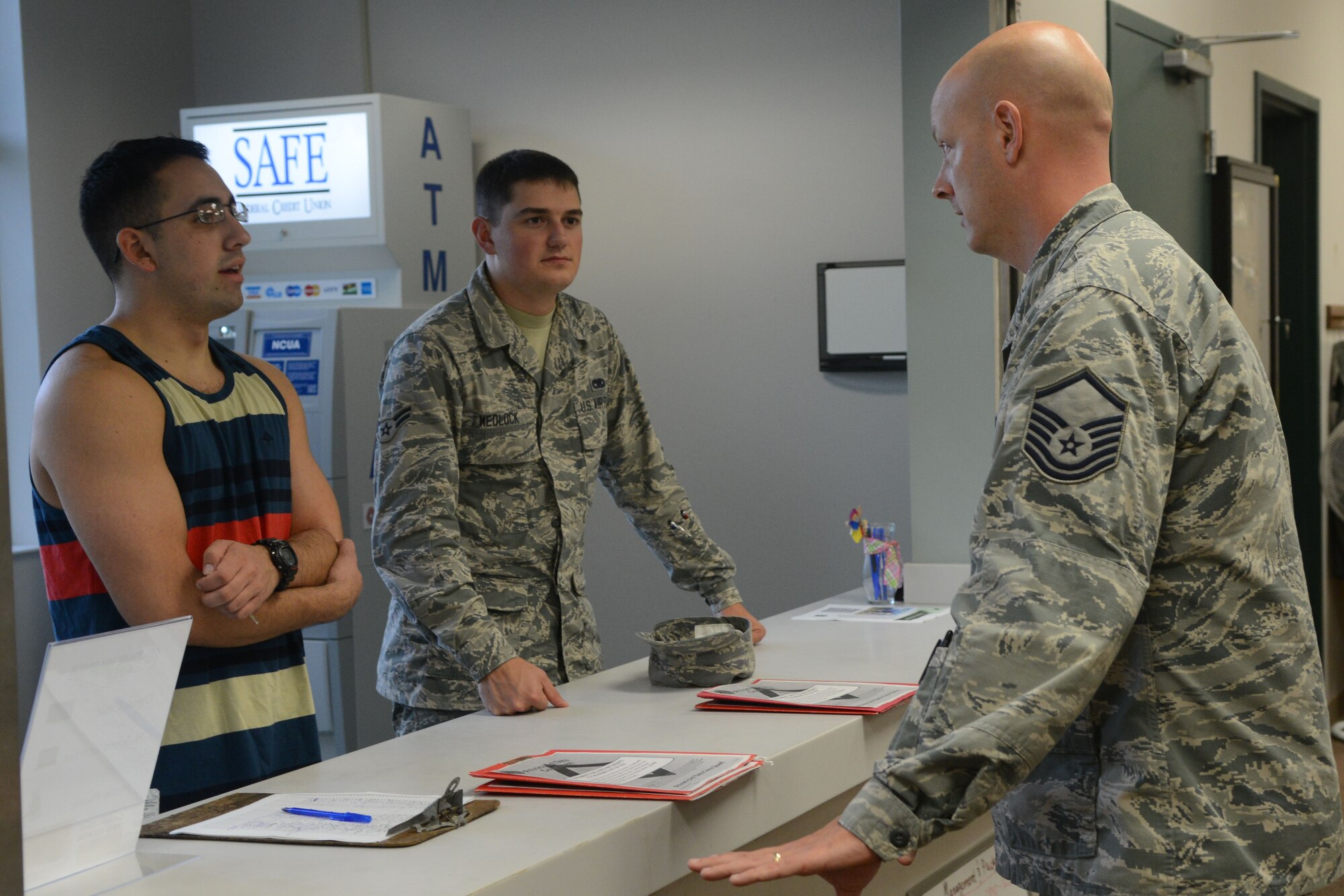 U.S. Air Force Master Sgt. Brian Ailstock 20th Civil Engineer Squadron section chief of unaccompanied housing, speaks to Airmen as they prepare to move out of their rooms at Shaw Air Force Base, S.C., Oct. 3, 2014. Unaccompanied housing consists of 712 rooms and currently has 625 occupants. (U.S. Air Force photo by Senior Airman Ashley L. Gardner/Released)