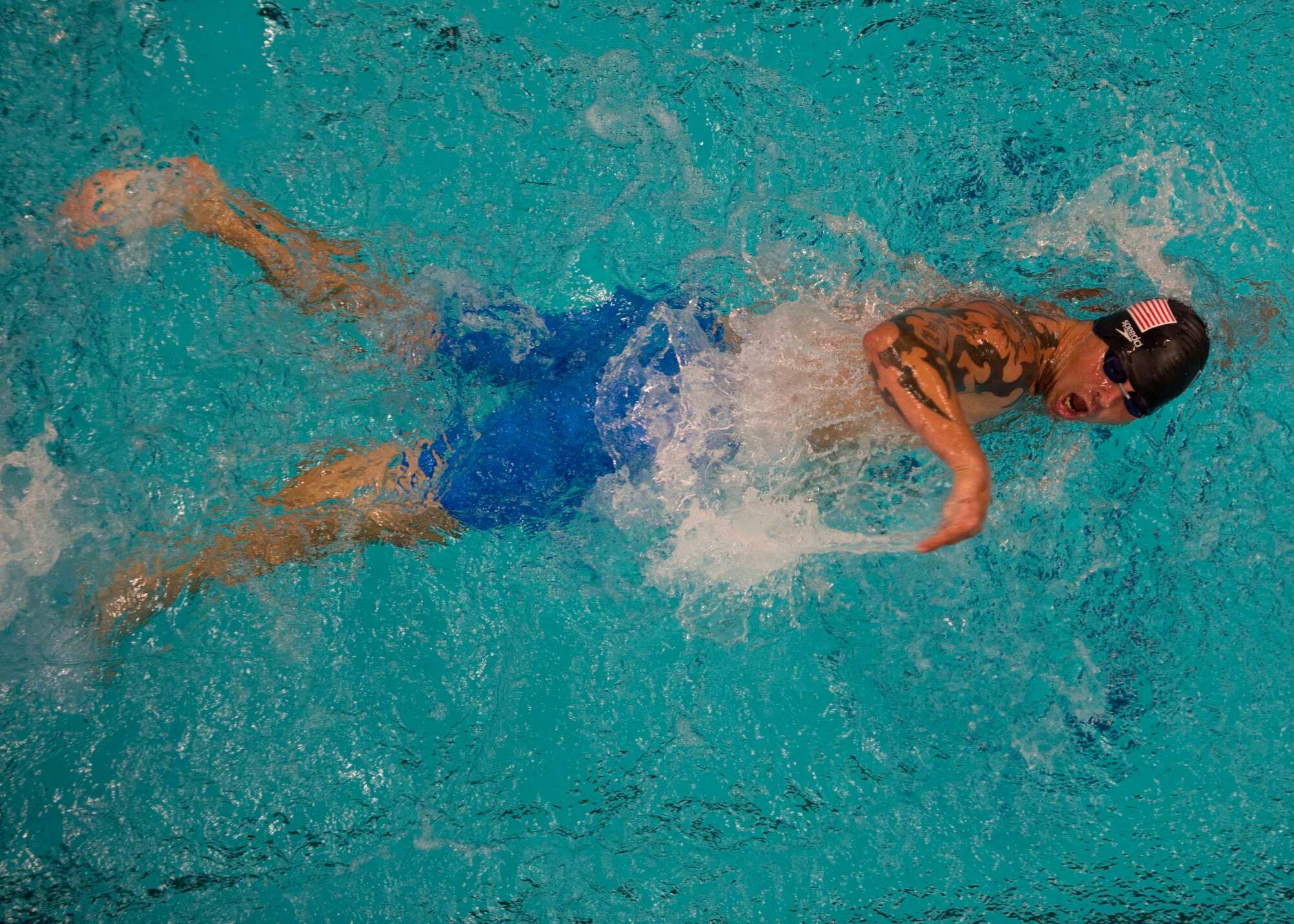 Air Force athlete Leonard Anderson competes in the 100-meter Freestyle race during the 2014 Warrior Games at the U.S. Olympic Training Center, Colorado Springs, Colorado, Sept. 30, 2014. The Warrior Games consists of athletes from throughout the Department of Defense, who compete in paralympic style events for their respective military branch. The goal of the games is to help highlight the limitless potential of warriors through competitive sports. (U.S. Air Force photo/Senior Airman Justyn M. Freeman)