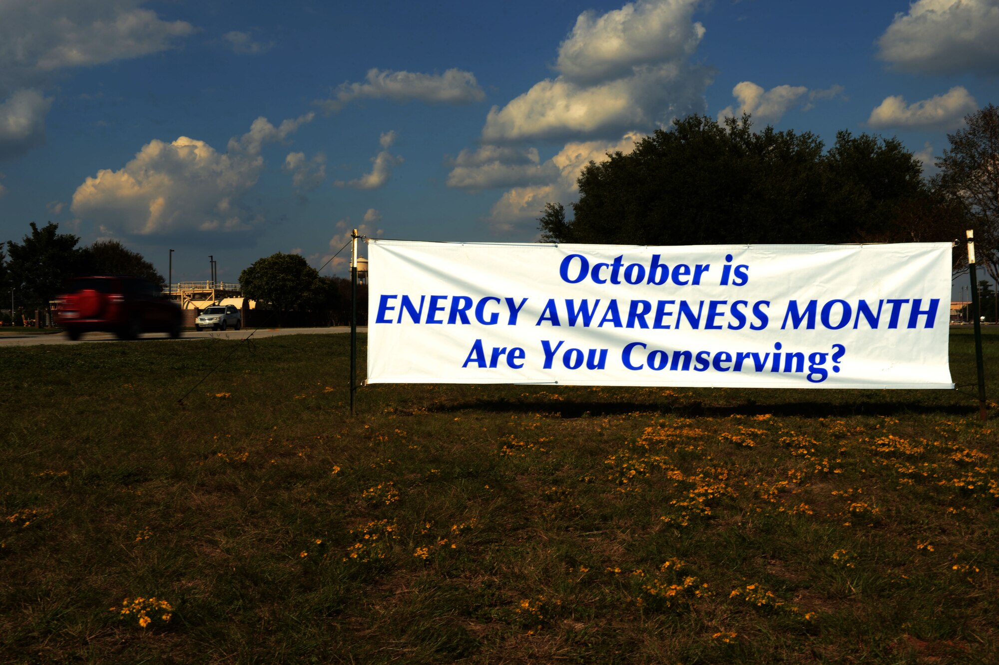An “October is Energy Awareness Month” sign is placed near the main gate at Shaw Air Force Base, S.C., Oct. 2, 2014. As part of an Air Force-wide initiative to conserve energy, four weekly tips have been put in place for Airmen to observe including power strip advice and thermostat ideas. (U.S. Air Force illustration by Airman 1st Class Jensen Stidham/Released)