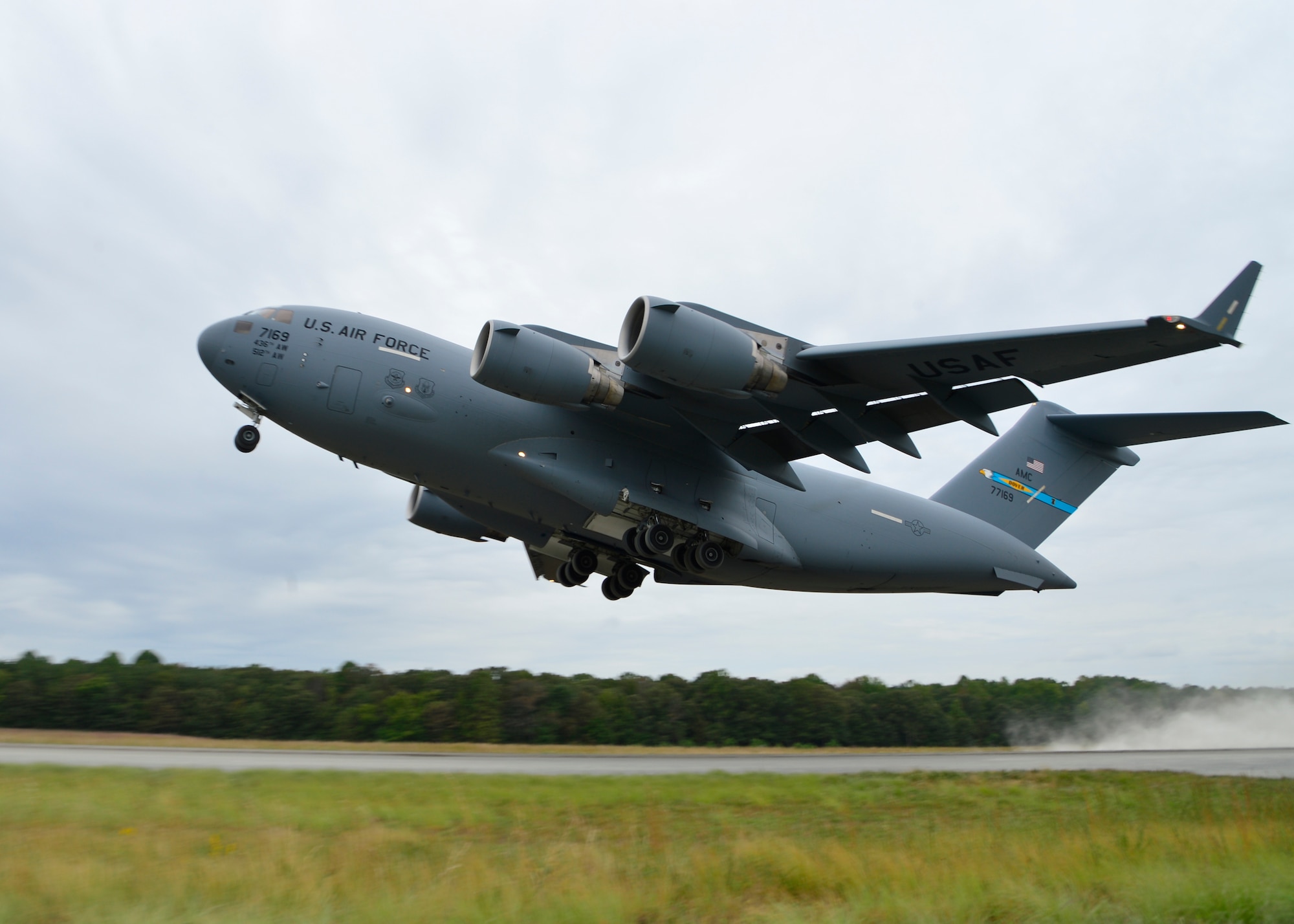 A C-17 Globemaster III takes off from an assault strip during semi-prepared runway operations, or SPRO training Sept. 24, 2014, at Fort A.P. Hill, Va. The C-17 aircraft is able to take-off and land with a full payload in as little as 3,000 feet. (U.S. Air Force photo/Airman 1st Class William Johnson)