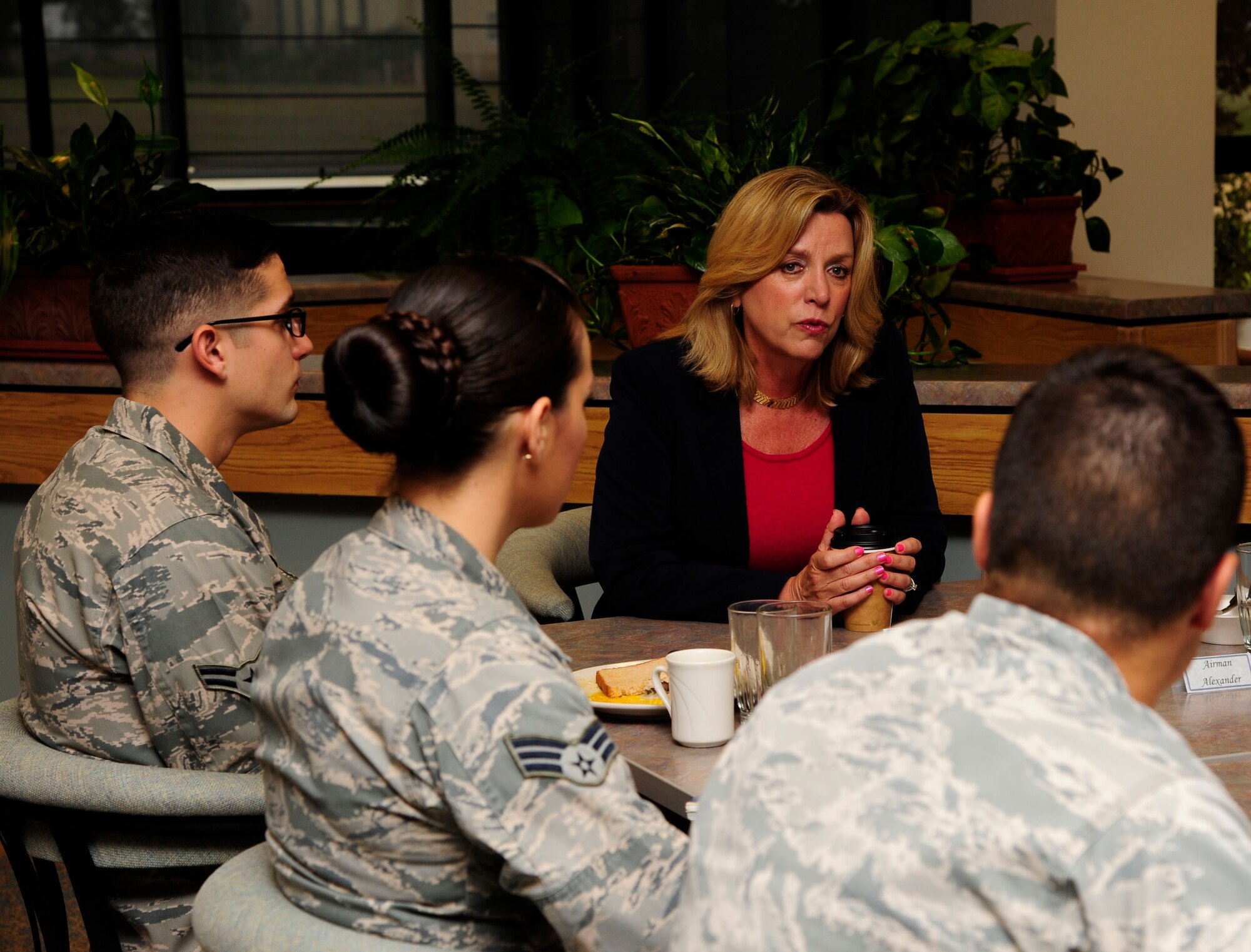 Secretary of the Air Force, Deborah Lee James, talks with Airmen of the 30th Space Wing during breakfast Sept. 24, 2014, Vandenberg Air Force Base, Calif. The meeting was a chance for Airmen to speak directly with the Secretary about Air Force topics. (U.S. Air Force photo by Tech. Sgt. Tyrona Lawson/ Released)

