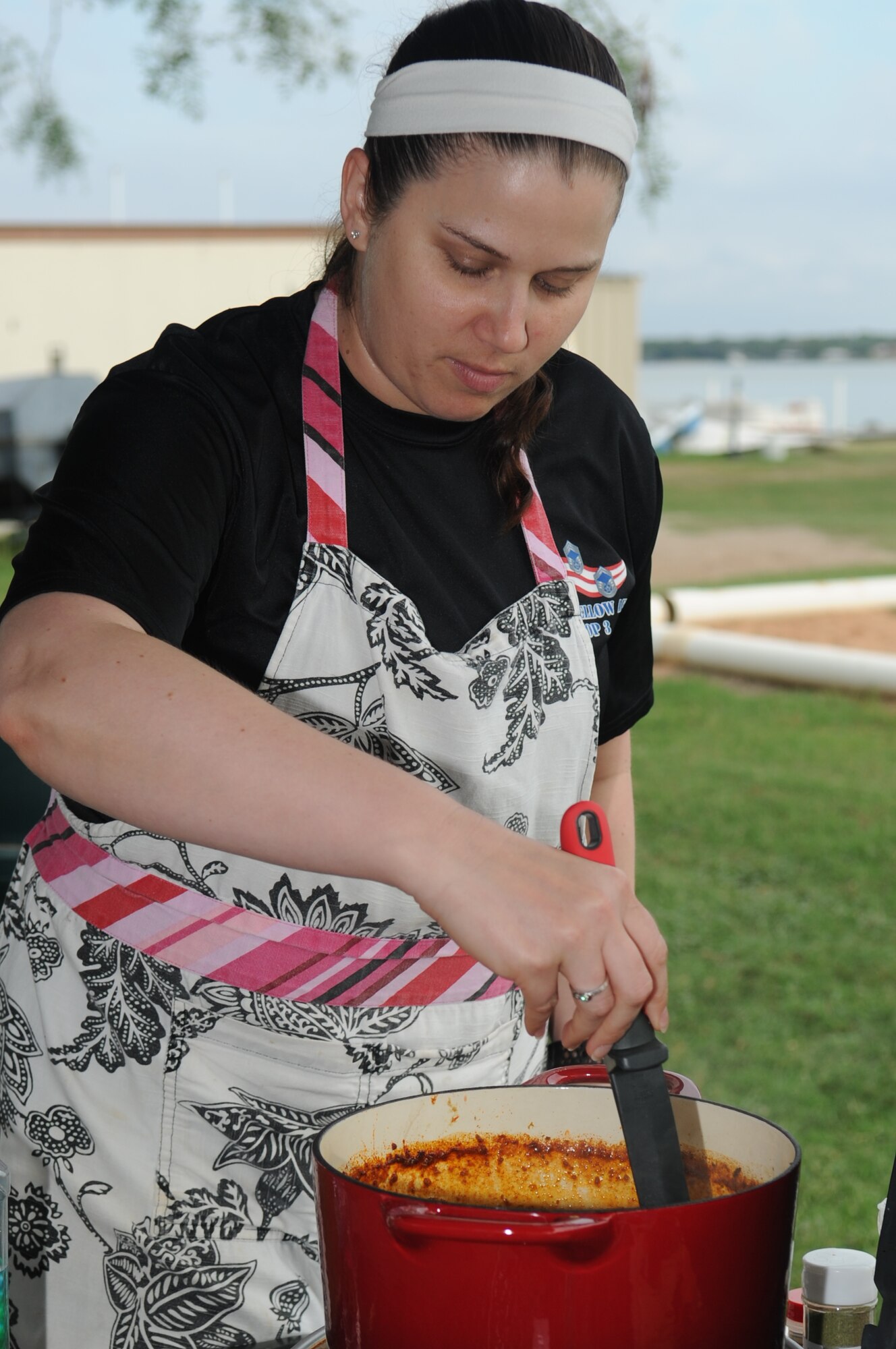 GOODFELLOW AIR FORCE BASE, Texas -- Master Sgt. Lisa A. Payne, 315th Training Squadron assistant first sergeant, stirs her team’s chili during the 41st Annual Armed Forces Chili Cook-off at the Recreation Camp Sept. 27. Payne competed with members of the bases Top 3 group, which won People’s Choice, Squadron Challenge, third place in Beans and sixth place in the Terlingua. (U.S. Air Force photo/ Staff Sgt. Laura R. McFarlane)