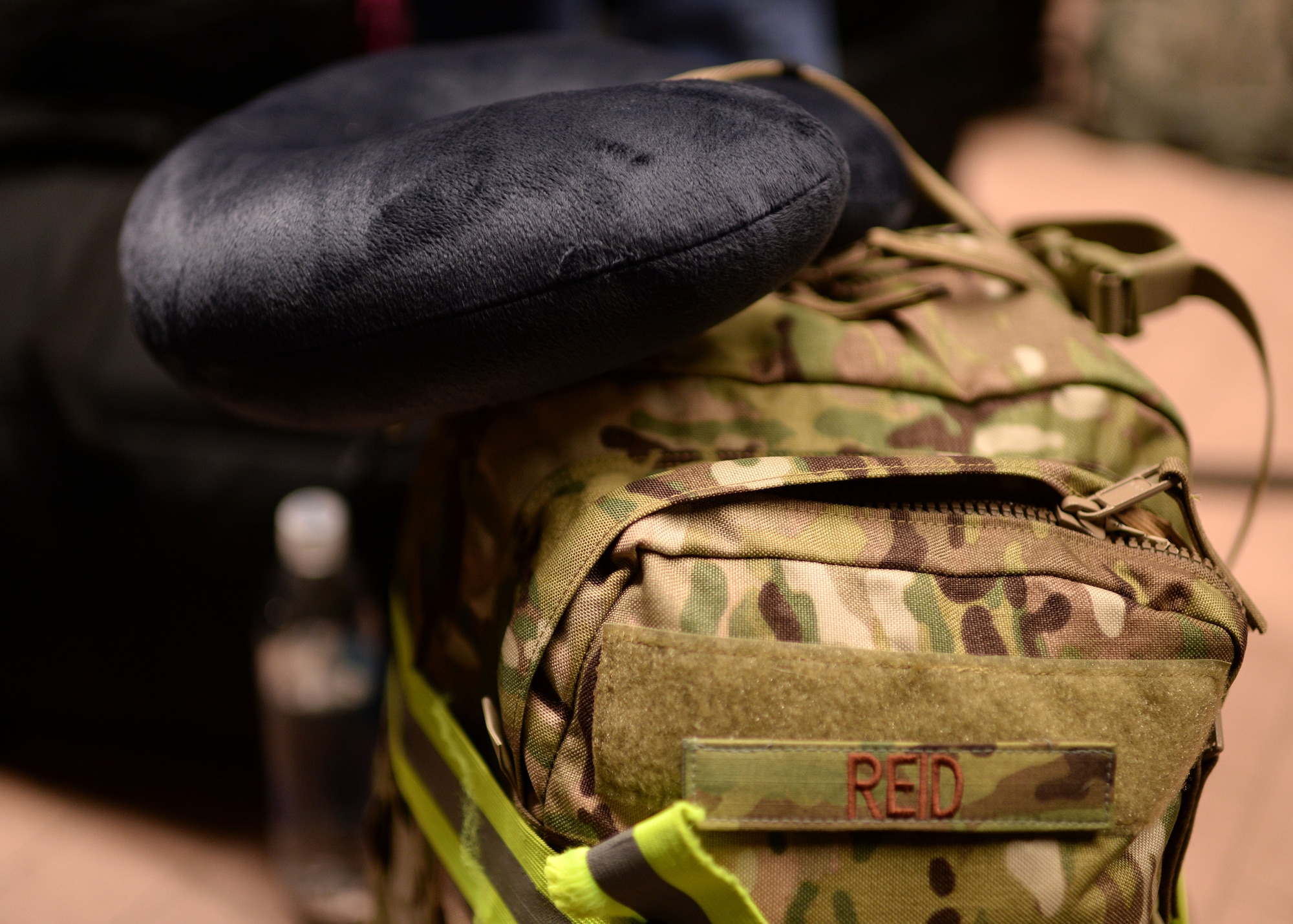 A bag rests on the floor of a processing point for the 606th Air Control Squadron Oct. 7, 2014, at Spangdahlem Air Base, Germany,  prior to the squadron's deployment to Southwest Asia. The Airmen packed various bags, which included their military uniforms, government weapons and necessary toiletries. (U.S. Air Force photo by Staff Sgt. Daryl Knee/Released)