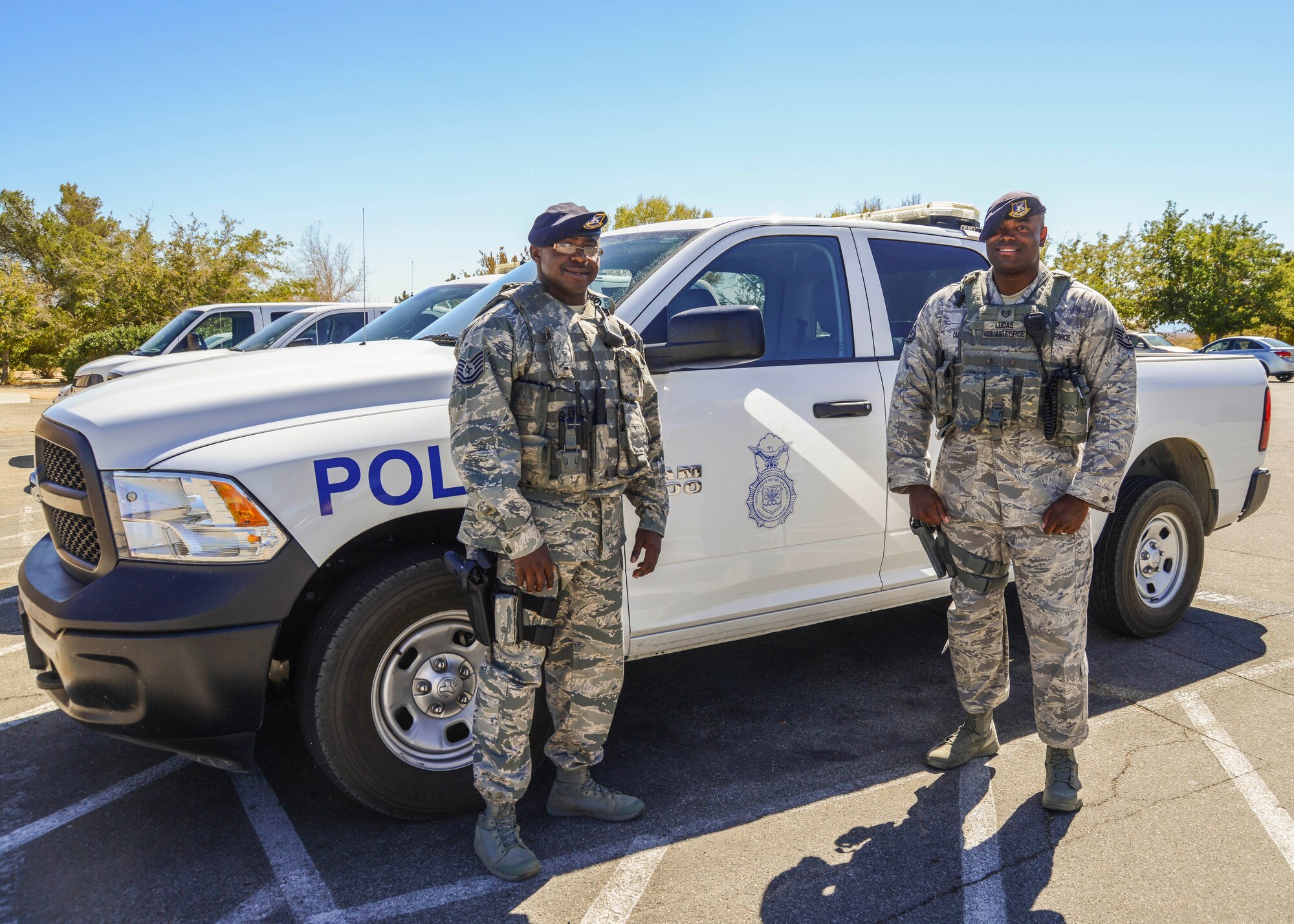 From left: Tech. Sgt. Elie Peán and Tech. Sgt. Maurice Lucas II, flight sergeants from the 412th Security Forces Squadron, prepared the Automated External Defibrillator when a man went into cardiac arrest at a Lancaster gym saving his life. (U.S. Air Force photo by Rebecca Amber) 
