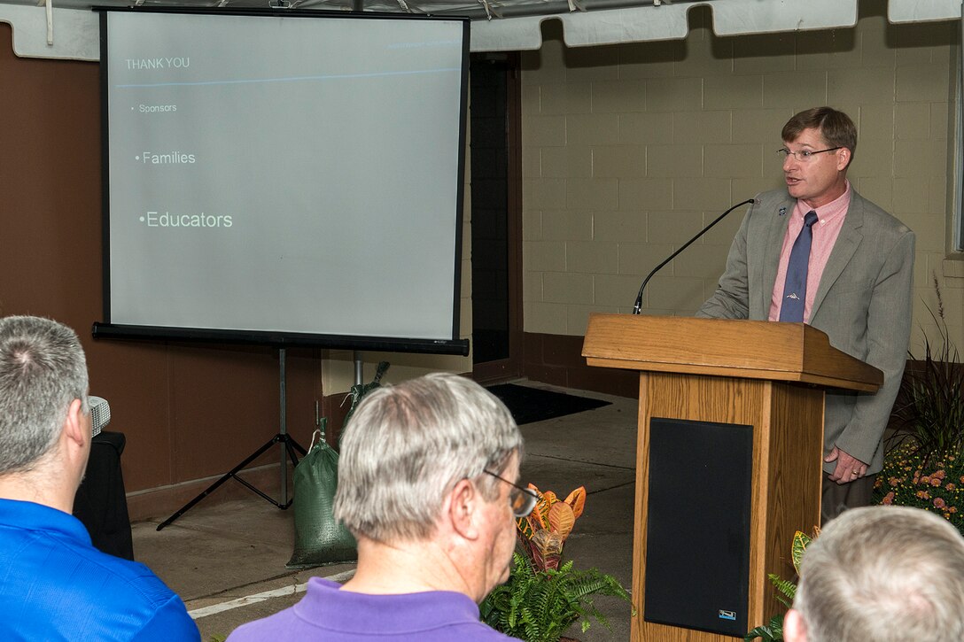 Andy Thomson speaks during the 15th anniversary celebration of STARBASE at Barksdale Air Force Base, La., Oct. 2, 2014. Thomson is the Global Strike Capabilities Lead for Northrop Grumman Aerospace Systems and retired with the rank of Colonel from the U.S. Air Force. (U.S. Air Force photo by Master Sgt. Greg Steele/Released)