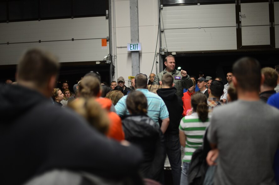 U.S. Air Force Col. Lars Hubert, 52nd Fighter Wing vice commander, speaks to a gathering of 606th Air Control Squadron Airmen and their loved ones from Spangdahlem Air Base, Germany, Oct. 7, 2014. The 606 ACS is a self-contained mobile combat unit with Airmen covering more than 21 specialties maintaining more than $170M worth of equipment. (U.S. Air Force photo by Senior Airman Gustavo Castillo/Released) 