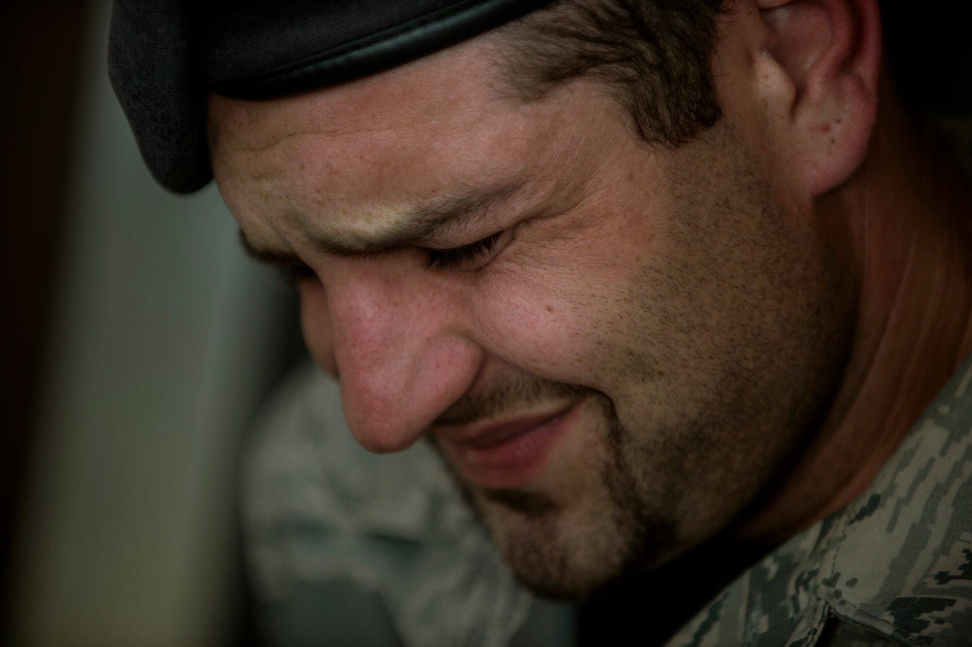 ZP3 Thorsten Damm, a 52nd Security Forces civilian police officer, winces in pain during an exercise scenario Oct. 4, 2014, at Spangdahlem Air Base, Germany. During the scenario, Damm was treated for a possible broken leg. (U.S. Air Force photo by Senior Airman Rusty Frank/Released)