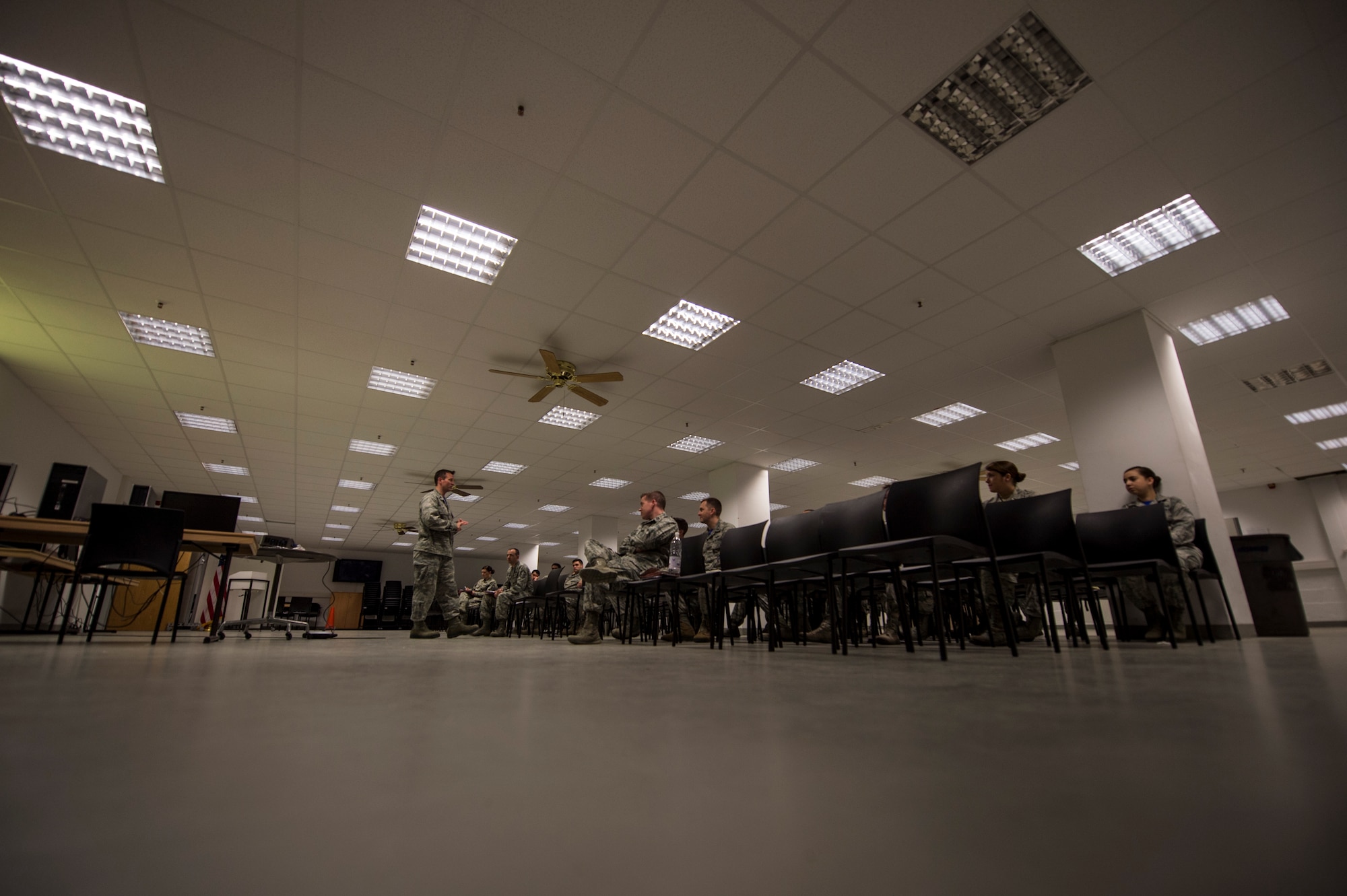 U.S. Air Force Lt. Col. Robert Long, 606th Air Control Squadron commander, briefs Airmen after processing through a deployment line Sept. 19, 2014, at Spangdahlem Air Base, Germany. The squadron deployed in support of Operation Enduring Freedom. (U.S. Air Force photo by Senior Airman Rusty Frank/Released)