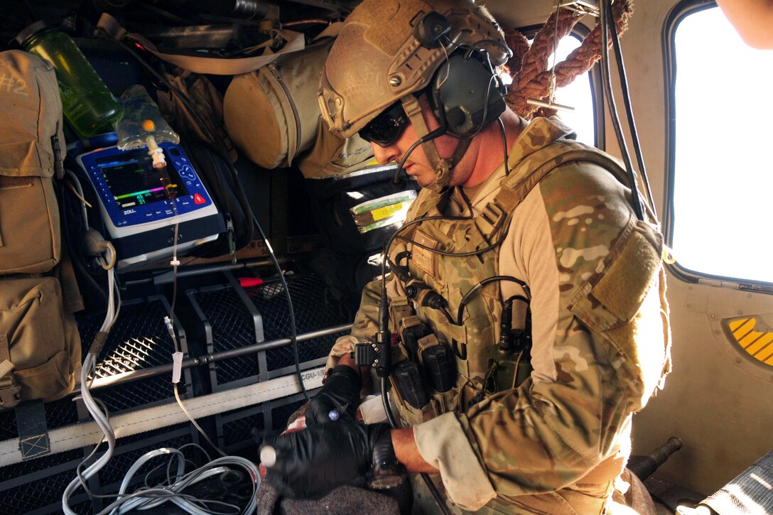 An Air Force pararescueman conducts tactical field training during a personnel recovery exercise as part of Soaring Angel 14 on Fort Hunter Liggett, Oct. 2, 2014. 