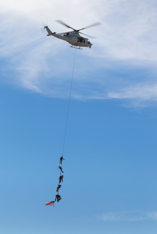 Marines demonstrate spy rigging from a UH-1Y Huey helicopter during the Marine Air Ground Task Force demonstration at the annual air show on Marine Corps Air Station Miramar, San Diego, Oct. 3, 2014. The Marines are assigned to the 1st Marine Division's 1st Reconnaissance Battalion, and the helicopter crew is assigned to Marine Light Attack Helicopter Squadron 469, Marine Aircraft Group 39, 3rd Marine Aircraft Wing.