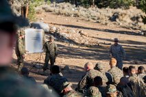 Gunnery Sergeant Daniel Brewer, team leader for the unit training section aboard Marine Corps Mountain Warfare Training Center, Bridgeport, California, give a class on mountain health awareness in preparation for the mobility phase of mountain warfare training, Oct. 3. Marines from Combat Logistics Battalion 6 and 2nd Battalion, 5th Marine Regiment attended the Summer Mountain Exercise aboard Matine Corps Mountain Warfare Training Center that spans a total of 21 says and teaches them how to survive in trecherous mountain terrain. (U.S. Marine Corps photo by LCpl. Preston McDonald/Released)