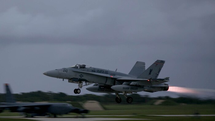 An F/A-18 Hornet takes off from Andersen Air Force Base Oct. 1 during  Forager Fury III. The overarching training exercise,which emphasizes tactical aviation and aviation ground to further develop a distributed, expeditionary combat capability while training within the Marianas Island range complex. The aircraft is with Marine Fighter Attack Squadron 115 currently assigned to Marine Aircraft Group 12, 1st Marine Aircraft Wing, III Marine Expeditionary Force under the unit deployment program.