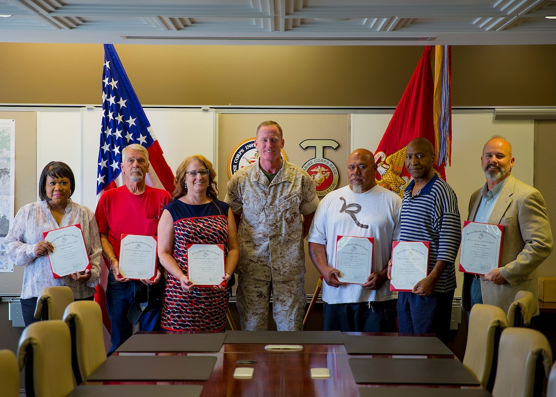 Six Camp Pendleton employees are recognized for federal length of service here, Oct. 6. Federal service includes both civilian and military service combined. Between the six employees, they have 190 years of honorable service.