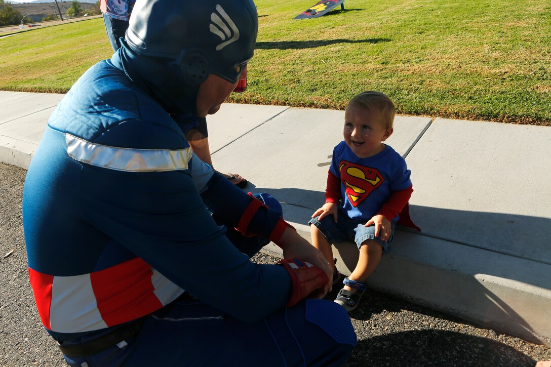 Families and local emergency responders met at De Luz Housing community center October 7 for the National Night Out. The National Night Out is an evening where emergency first responders and families come together, to get the community and children more involved with the fire fighters, police officers and other responders. 