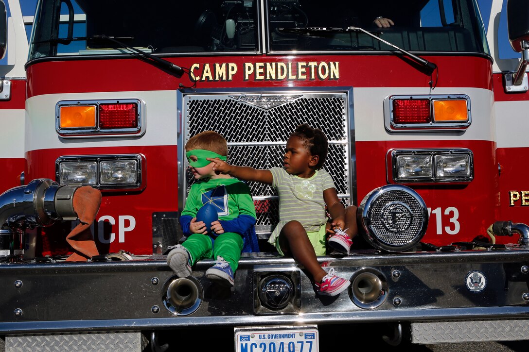 Families and local emergency responders met at De Luz Housing community center October 7 for the National Night Out. The National Night Out is an evening where emergency first responders and families come together, to get the community and children more involved with the fire fighters, police officers and other responders. 