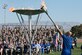 Master Sgt. Christopher Aguilera lights the cauldron signifying the beginning of the Air Force Wounded Warrior Trails April 7, 2014, at Nellis Air Force Base, Nev. Aguilera, who is a survivor of the June 9, 2010 “Pedro 66” helicopter crash in southwest Afghanistan, will participate in in seven events during the trials. (U.S. Air Force photo/Lorenz Crespo) 
