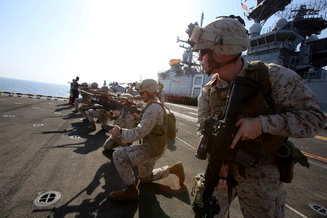 Marines with Golf Company, Battalion Landing Team, 2nd Battalion 1st Marines (BLT 2/1), 11th Marine Expeditionary Unit (MEU), conduct squad tactics drills and remedial action drills aboard the USS Makin Island (LHD 8), Oct. 7. The 11th MEU is deployed with the Makin Island Amphibious Ready Group as a theater reserve and crisis response force throughout U.S. Central Command and the U.S 5th Fleet area of responsibility. (U.S. Marine Corps photo by Cpl. Demetrius Morgan/RELEASED)