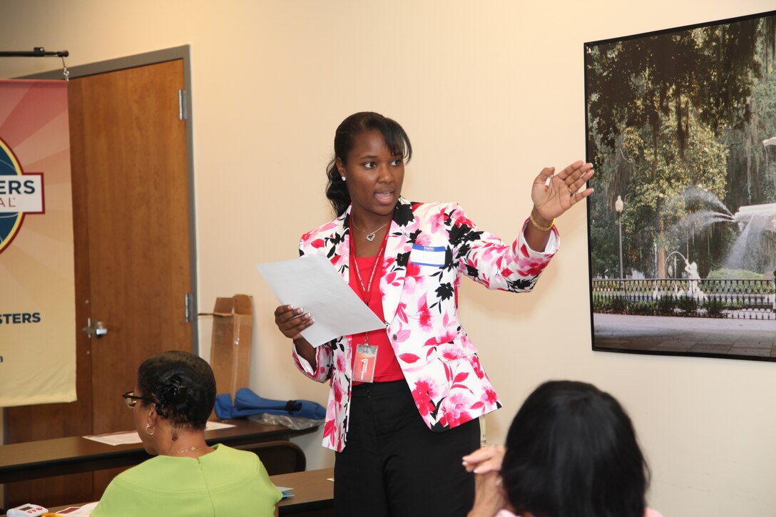 An evaluator presents a report at the conclusion of the Castle Toastmasters open house event Oct. 2. Evaluators fulfill leadership roles within the Toastmasters organization by assessing the meeting environment or speeches delivered by other members. Example roles include “um” and “ah” counters. Those who assume all of the assigned leadership roles can receive the Competent Leader Award or the Advanced Competent Leader Award.