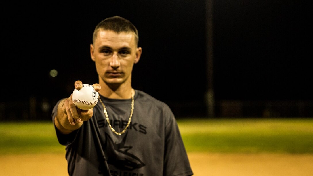 U.S. Marine Pfc. Anthony M. Prohaska poses with a baseball aboard Camp Pendleton, Calif., Oct. 6, 2014. Prohaska, 21, is from Fort Myers, Fla., and is an administrative specialist with the 15th Marine Expeditionary Unit. (U.S. Marine Corps photo by Sgt. Emmanuel Ramos/Released)