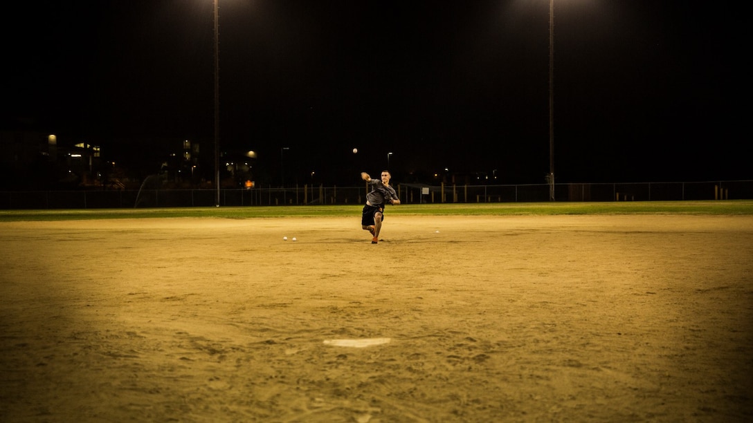 U.S. Marine Pfc. Anthony M. Prohaska throws a baseball aboard Camp Pendleton, Calif., Oct. 6, 2014. Prohaska, 21, is from Fort Myers, Fla., and is an administrative specialist with the 15th Marine Expeditionary Unit himself. (U.S. Marine Corps photo by Sgt. Emmanuel Ramos/Released)
