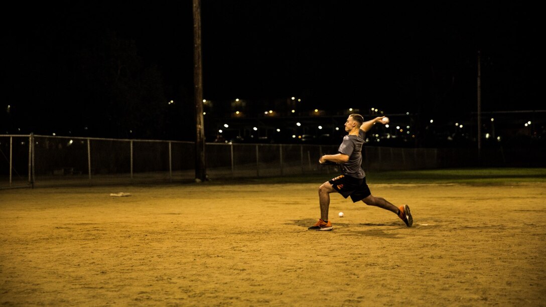 U.S. Marine Pfc. Anthony M. Prohaska throws a baseball aboard Camp Pendleton, Calif., Oct. 6, 2014. Prohaska, 21, is from Fort Myers, Fla., and is an administrative specialist with the 15th Marine Expeditionary Unit. (U.S. Marine Corps photo by Sgt. Emmanuel Ramos/Released)