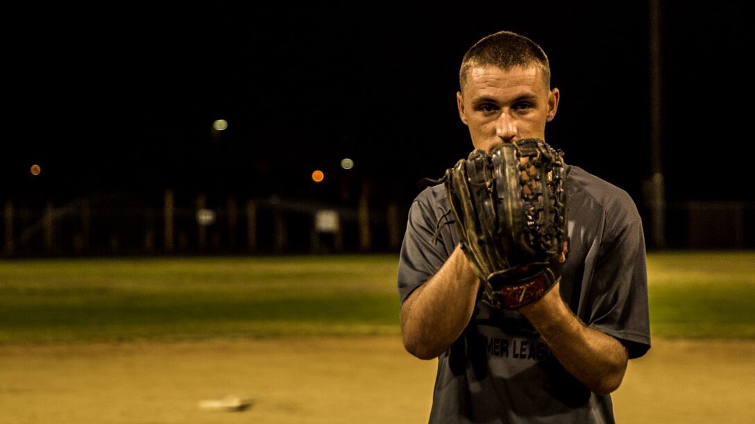 U.S. Marine Pfc. Anthony M. Prohaska prepares to throw a baseball aboard Camp Pendleton, Calif., Oct. 6, 2014. Prohaska, 21, is from Fort Myers, Fla., and is an administrative specialist with the 15th Marine Expeditionary Unit. (U.S. Marine Corps photo by Sgt. Emmanuel Ramos/Released)