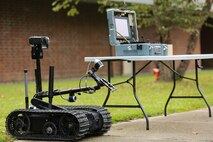 Marines with Explosive Ordnance Disposal Company, 8th Engineer Support Battalion, 2nd Marine Logistics Group, provided a class and demonstration on some of their robots to the students of Lejeune High School, Oct. 3, 2014, aboard Marine Corps Base Camp Lejeune, N.C. Approximately 60 students, ranging from freshmen to seniors, packed the classroom to hear how the Marines use robotics on the battlefield and how engineering can better people’s lives. The school requested the Marines give the demonstration because the students are beginning their robotics curriculum of the Bio-Tech Department course of study. (U.S. Marine Corps photo by Cpl. Michael Dye / Released)