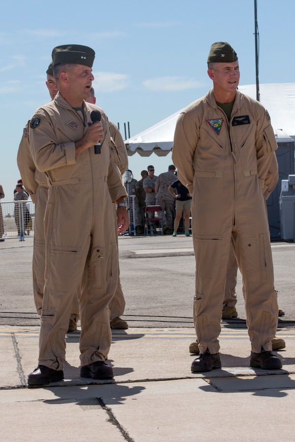 Maj. Gen. Michael Rocco, left, 3rd Marine Aircraft Wing commanding general, and Col. John Farnam, commanding officer of Marine Corps Air Station Miramar, welcome audience members at the 2014 Miramar Air Show aboard MCAS Miramar, Calif., Oct. 3. The air show began with an opening ceremony followed by the Marine Air Ground Task Force demo.