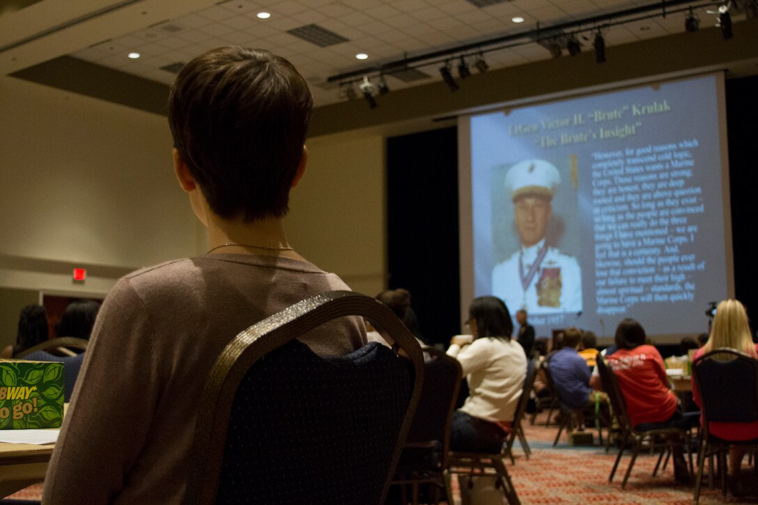 Students from Georgia Southern University watch a presentation during Col. William J. Bowers, Commanding Officer of 6th Marine Corps District, speech Oct. 4, 2014 at Georgia Southern University. (Official Marine Corps photo by Cpl. John-Paul Imbody)