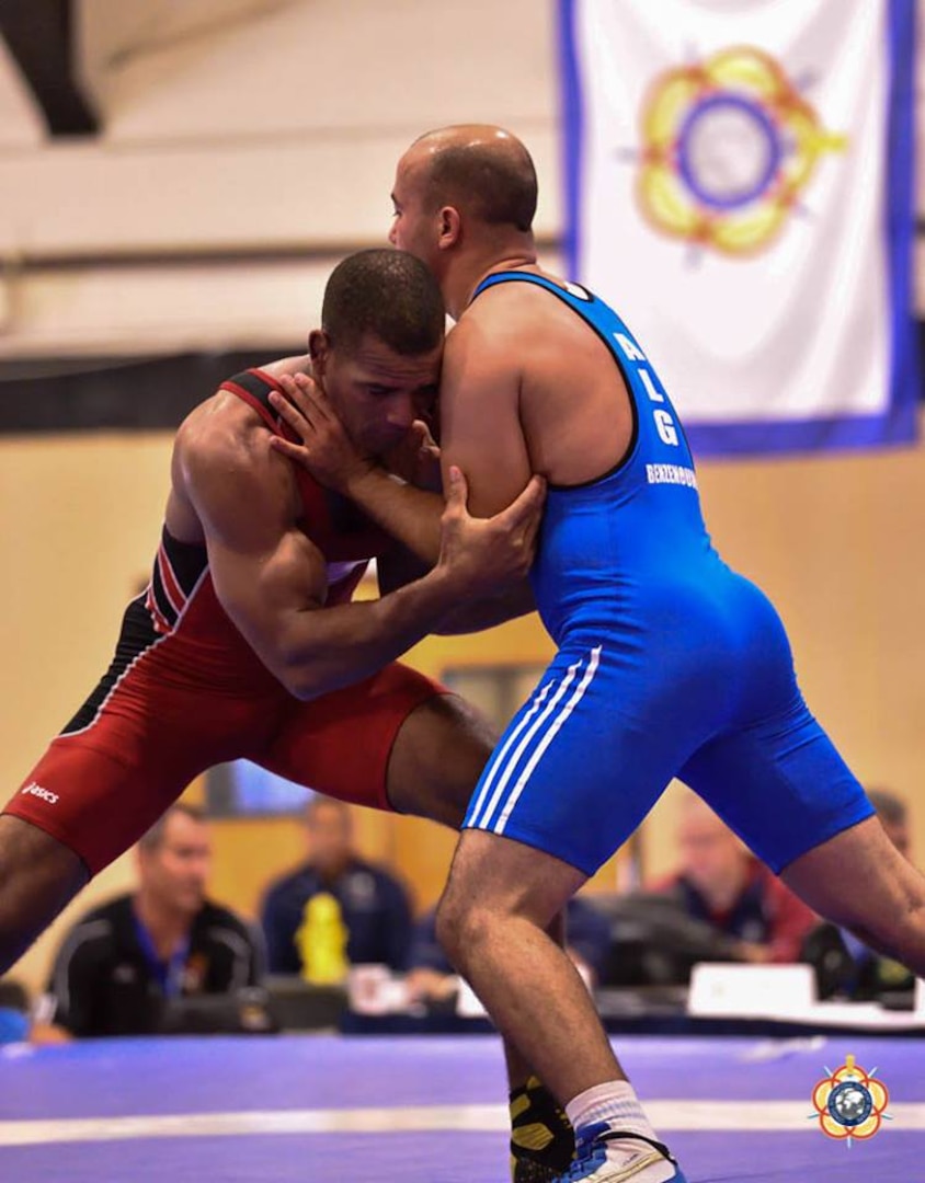 Air Force Master Sgt. Sherwin Severin defeats Abdelhak BENZANOUNE (Algeria) 4-1 in the Greco-Roman 80kg competition at the 29th CISM World Military Wresting Championship at Joint Base McGuire-Dix-Lakehurst, New Jersey 1-8 October.