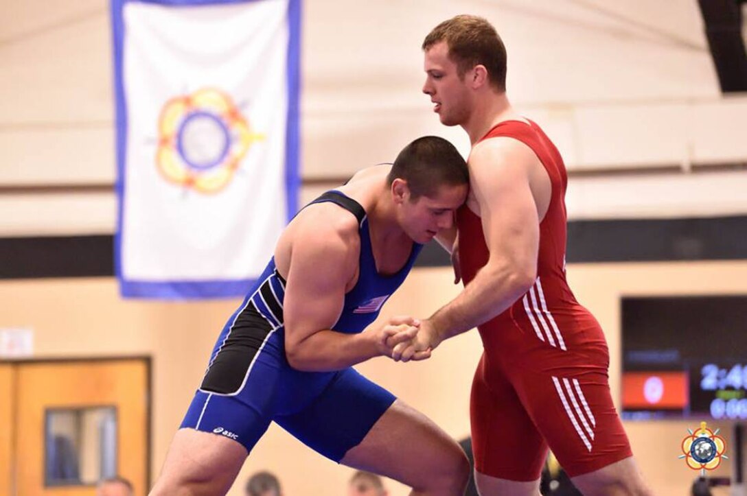 Army Sgt. Pete Gounaridis against Oliver Hassler (Germany) in the 98kg Greco-Roman competition at the 29th CISM World Military Wresting Championship at Joint Base McGuire-Dix-Lakehurst, New Jersey 1-8 October. Gounaridis placed 5th overall, with Hassler (red) won the gold medal.