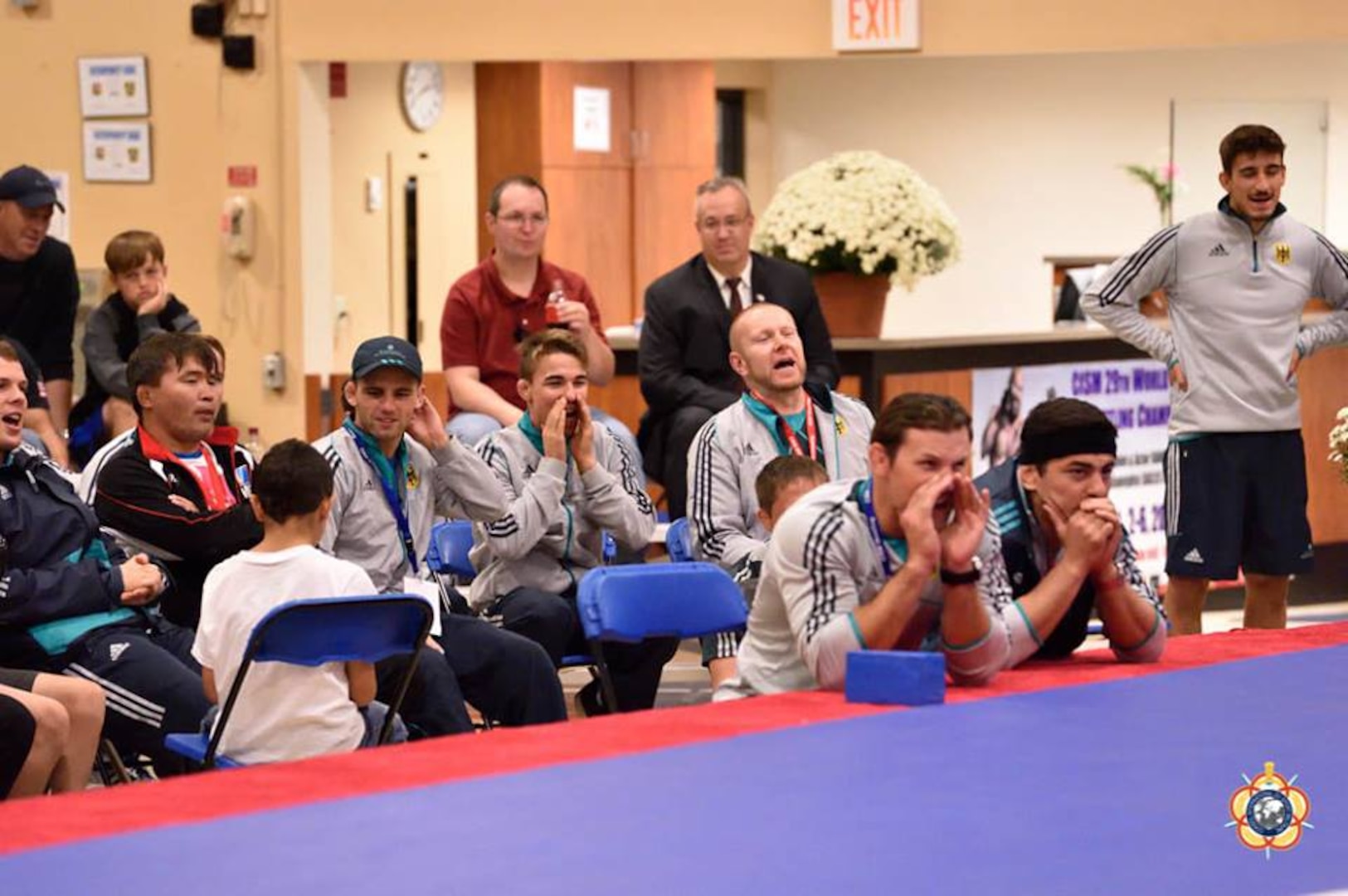 Team Germany cheers on at the 29th CISM World Military Wresting Championship at Joint Base McGuire-Dix-Lakehurst, New Jersey 1-8 October.