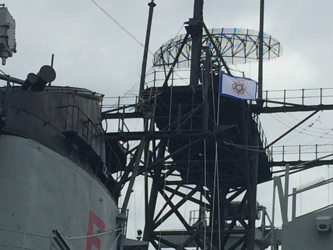 Lowering of the CISM Flag from the mast of the Battleship USS New Jersey during the closing ceremony of the 29th CISM World Military Wresting Championship at Joint Base McGuire-Dix-Lakehurst, New Jersey 1-8 October.