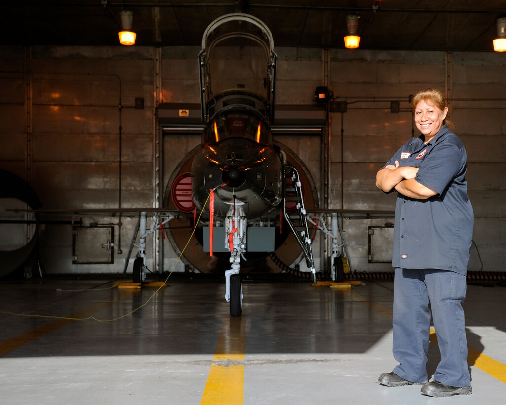 Yolanda Reyes, 47 Maintenance Directorate T-38 Talon engineer mechanic, poses in front of a T-38, at Laughlin Air Force Base on Sept. 25, 2014.  Reyes served in the Air Force Reserves as air cargo and on the civil service side working on plane engines at Kelly Air Force Base, Texas.  She has been working as an engineer mechanic for more than 20 years. She is this week’s Hispanic Heritage feature. (U.S. Air Force photo by Airman 1st Class Jimmie D. Pike) (Released)  