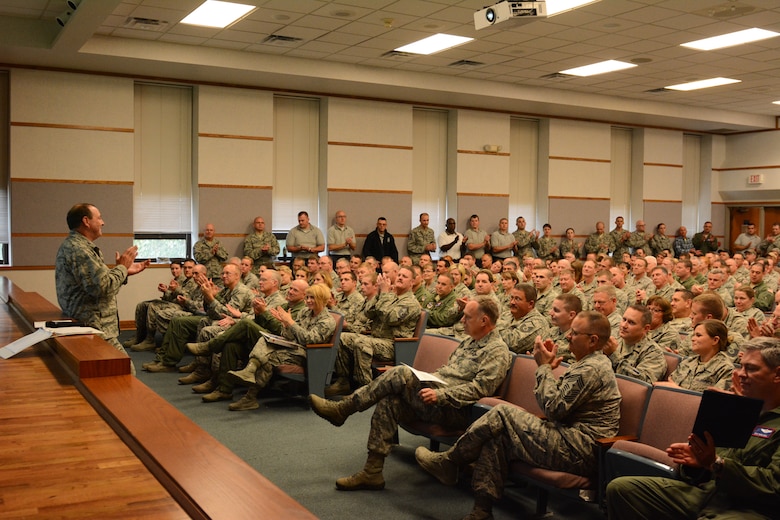 U.S. Air Force Col. Ralph Schwader, commander of the 139th Airlift Wing, Missouri Air National Guard, briefs the results of the Unit Effectiveness Inspection Oct. 8, 2014, at Rosecrans Air National Guard Base, Mo. The Wing received a rating of ‘effective’ from Air Mobility Command’s Inspector General. (U.S. Air National Guard photo by Senior Airman Patrick Evenson)