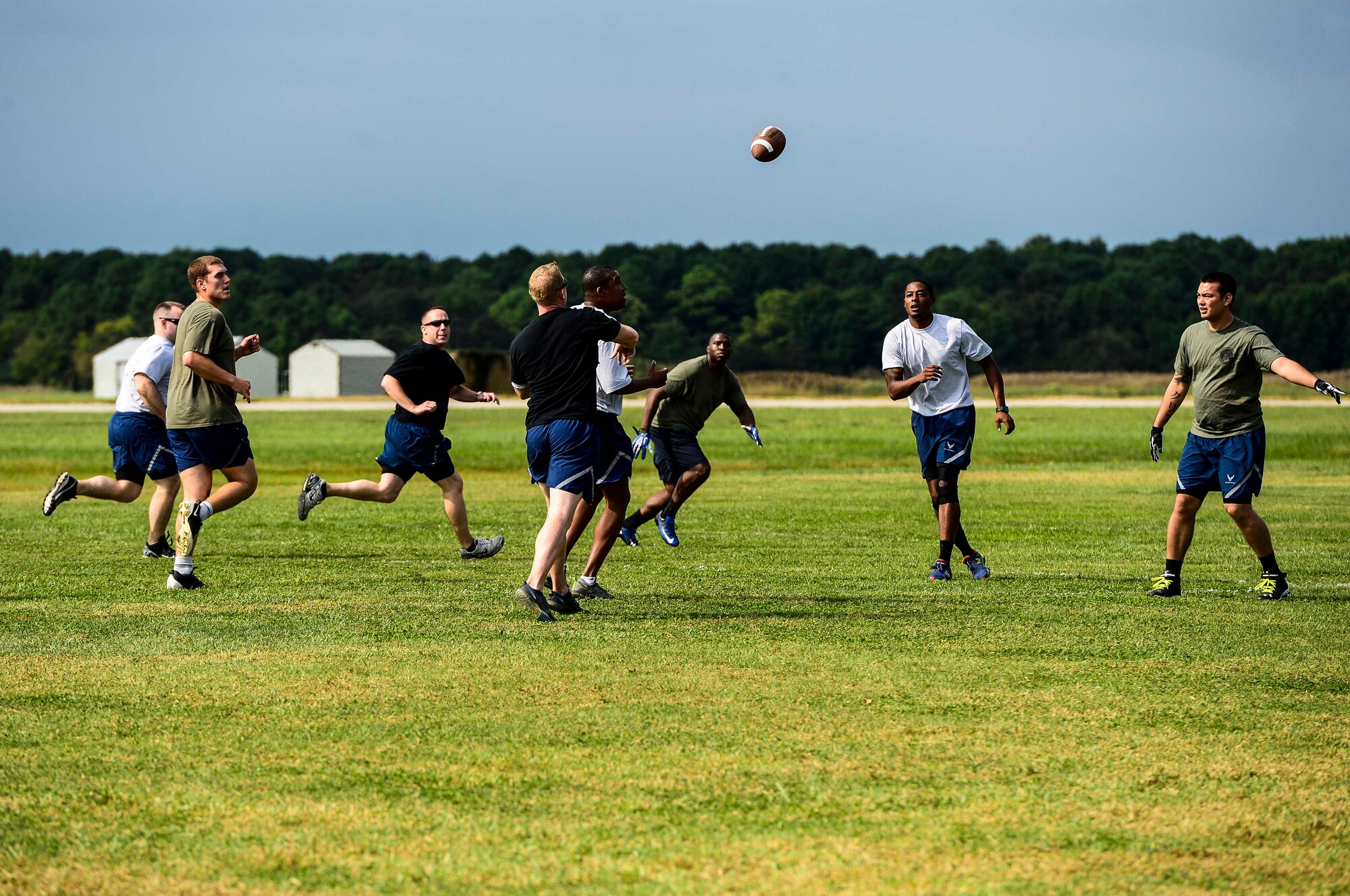 U.S. Air Force Airmen participate in the ultimate football tournament during the Joint Base Langley-Eustis Warrior Olympics at Langley Air Force Base, Va., Oct. 3, 2014. The Olympics ended with the 633rd Civil Engineer Squadron placing first. (U.S. Air Force photo by Senior Airman Kayla Newman/Released)