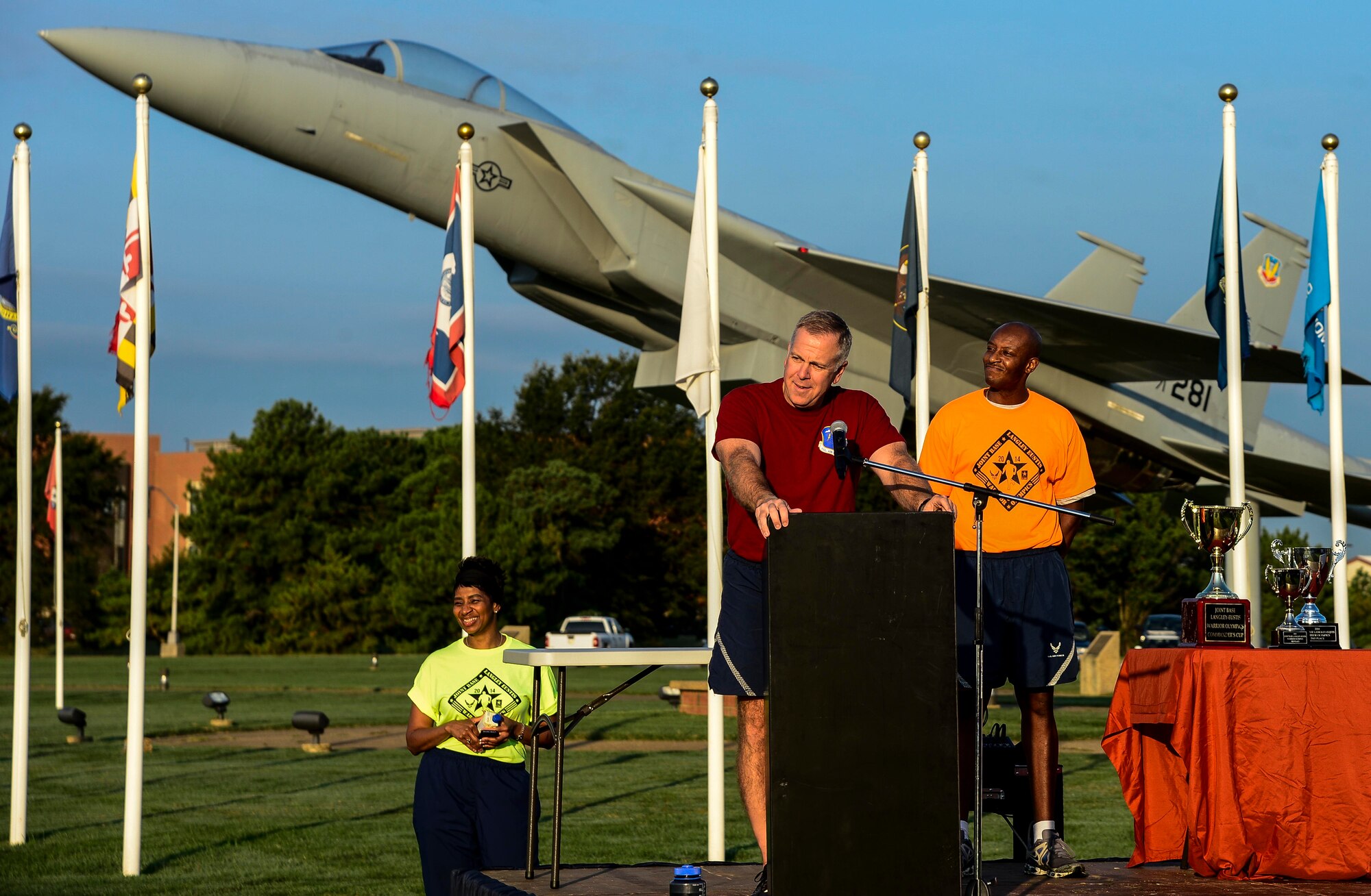 U.S. Air Force Col. John J. Allen Jr., 633rd Air Base Wing commander, provides the opening remarks at the Joint Base Langley-Eustis Warrior Olympics at Langley Air Force Base, Va., Oct. 3, 2014. During the closing ceremony, awards were given to the first, second and third place teams based off of the number of events won.   (U.S. Air Force photo by Senior Airman Kayla Newman/Released)