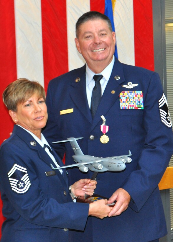 TRAVIS AIR FORCE BASE, Calif. -- The legacy of a flying family at Travis Air Force Base ended Oct. 3, 2014, with the retirement of Chief Master Sgt. Shawn Sanborn, 301st Airlift Squadron loadmaster superintendent. (U.S. Air Force photo/Ellen Hatfield)   