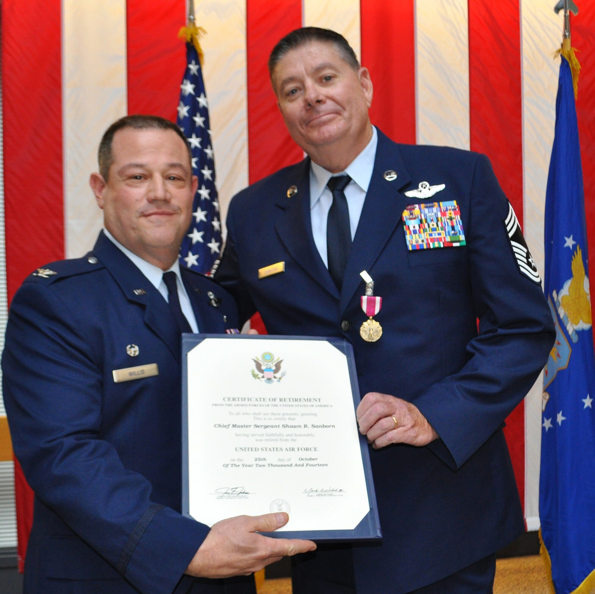 TRAVIS AIR FORCE BASE, Calif. -- The legacy of a flying family at Travis Air Force Base ended Oct. 3, 2014, with the retirement of Chief Master Sgt. Shawn Sanborn, 301st Airlift Squadron loadmaster superintendent. (U.S. Air Force photo/Ellen Hatfield)   