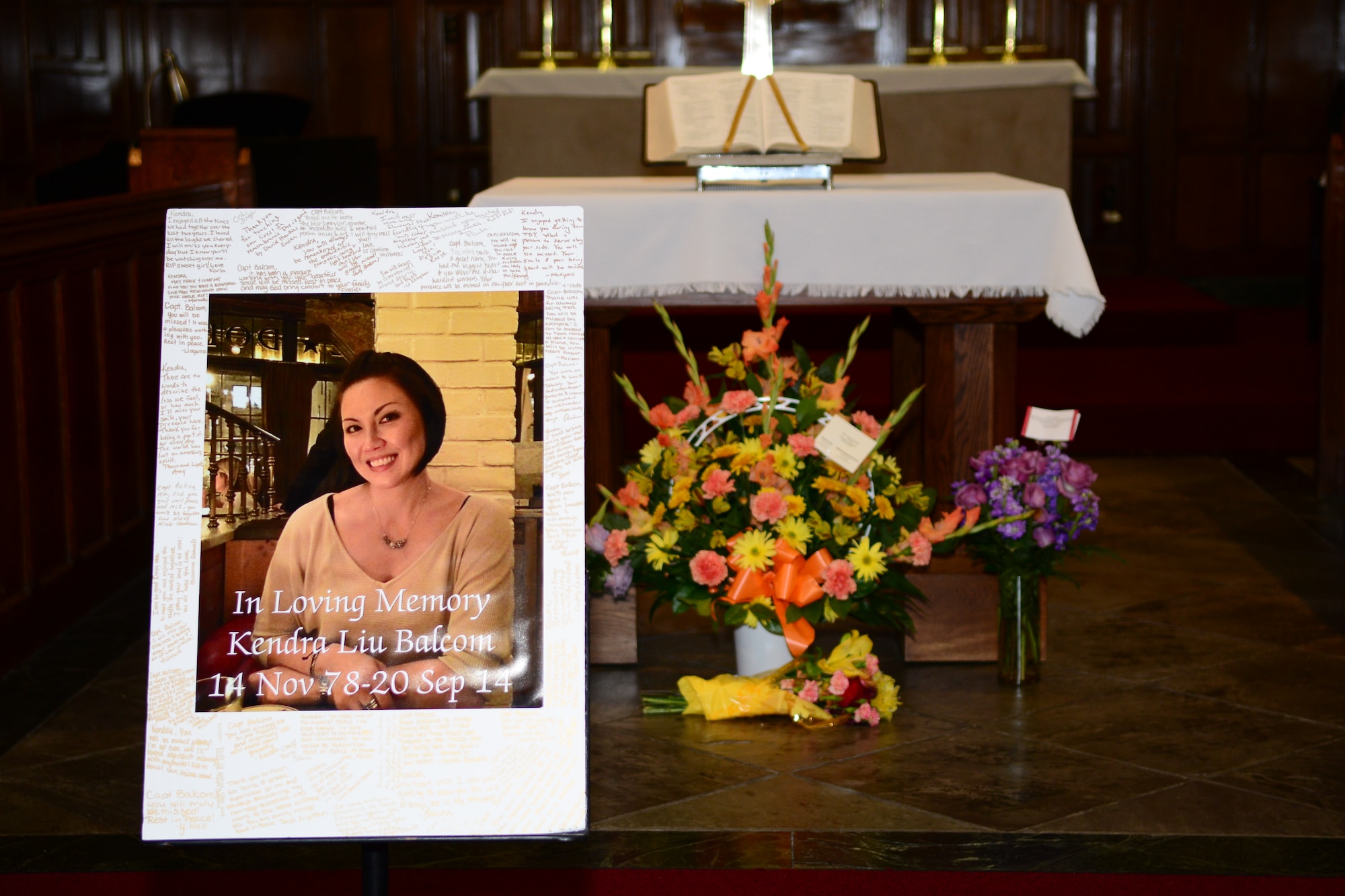 The Chaplain’s Ministry holds a memorial service for U.S. Air Force Capt. Kendra Balcom in the Chapel at Langley Air Force Base, Va., Oct. 3, 2014. Balcom, former 633rd Inpatient Squadron Maternal Child flight labor and delivery nurse, passed away in her home Sept. 20, at the age of 35. (U.S. Air Force photo by Airman 1st Class Devin Scott Michaels/Released)