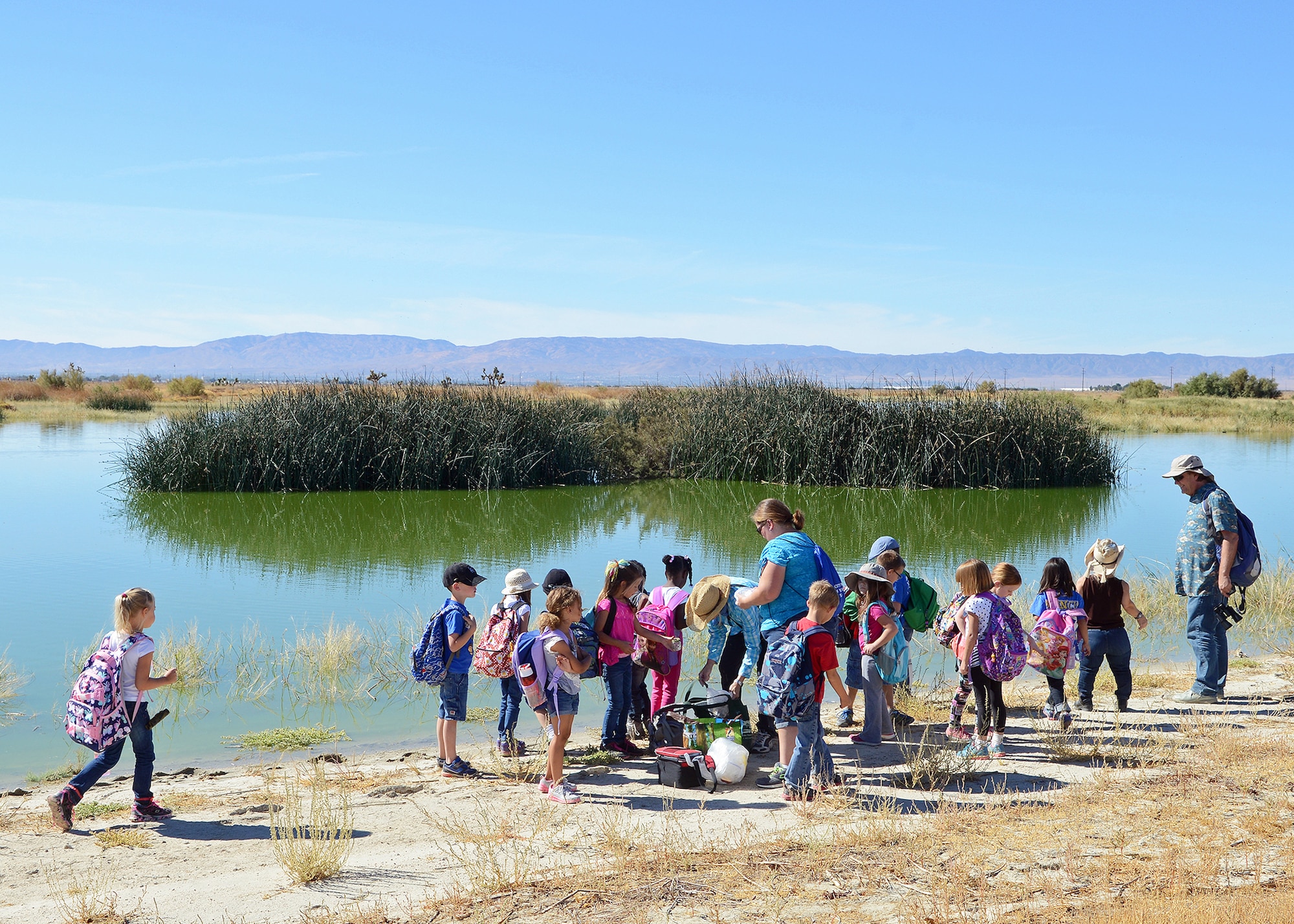The Edwards AFB Disability Employment Awareness Month Committee invited wounded warriors and students out to Piute Ponds for a morning of birding. Covering up to 600 acres on the base's southwest corner, the freshwater marsh is comprised of channels, dikes and evaporation ponds with water supplied from a Los Angeles County wastewater treatment plant.The marsh attracts migratory birds because of its location along the Great Basin corridor of the Pacific Flyway - one of four major bird migration routes across the United States. The stop at the ponds is one of several events Edwards is putting on for DEAM. (U.S. Air Force photo by Jet Fabara)
 

