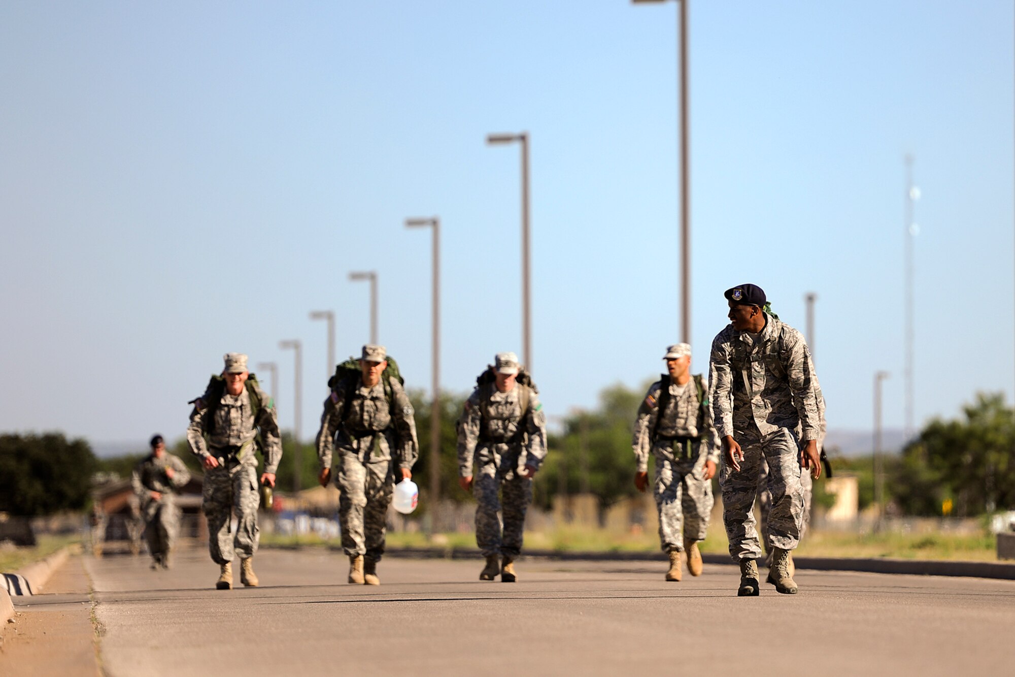 GOODFELLOW AIR FORCE BASE, Texas – Goodfellow members make their last stretch toward the finish line during the 8th Annual Airman 1st Class Jacobson 4.1-Mile Memorial Ruck March Oct. 4. Each teams’ time was recorded when the last person on the team crossed the finish line. Team One placed first with a time of 55:30. (Air Force photo/ Airman 1st Class Devin Boyer)