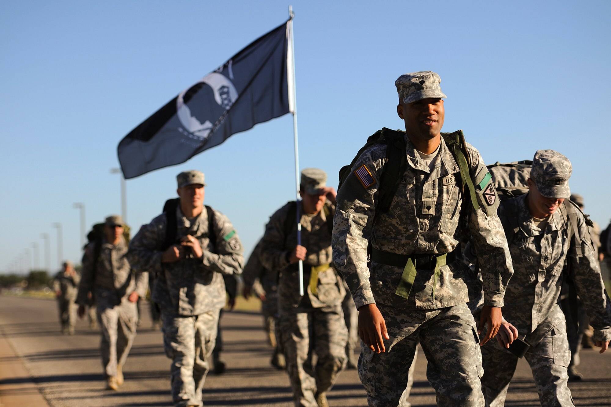 GOODFELLOW AIR FORCE BASE, Texas – Goodfellow members participate in the 8th Annual Airman 1st Class Jacobson 4.1-Mile Memorial Ruck March Oct. 4. The ruck march is hosted each year by the 17th Security Forces Squadron in honor of Airman 1st Class Elizabeth Jacobson, former 17th SFS member who was killed in Operation Iraqi Freedom nine years ago. (Air Force photo/ Airman 1st Class Devin Boyer)