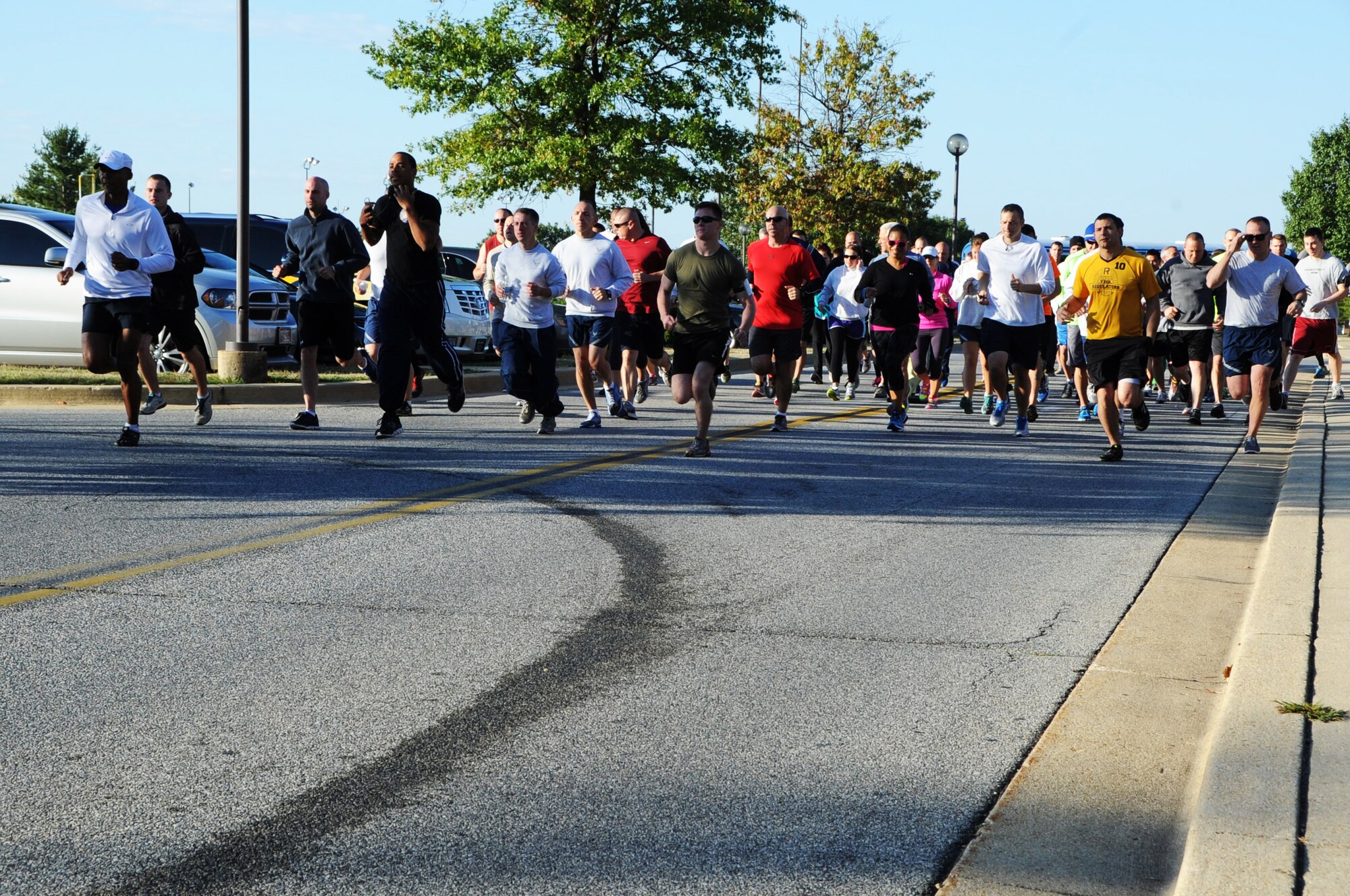 Airmen from the Air Force District of Washington participate in a 5K Fun Run to kick off the Combined Federal Campaign on Joint Base Andrews, Maryland, Oct. 6, 2014. The National Capital Area CFC runs Oct. 6 through Nov. 17 raising money for a variety of charity organizations. (U.S. Air Force photo/Staff Sgt. Matt Davis)