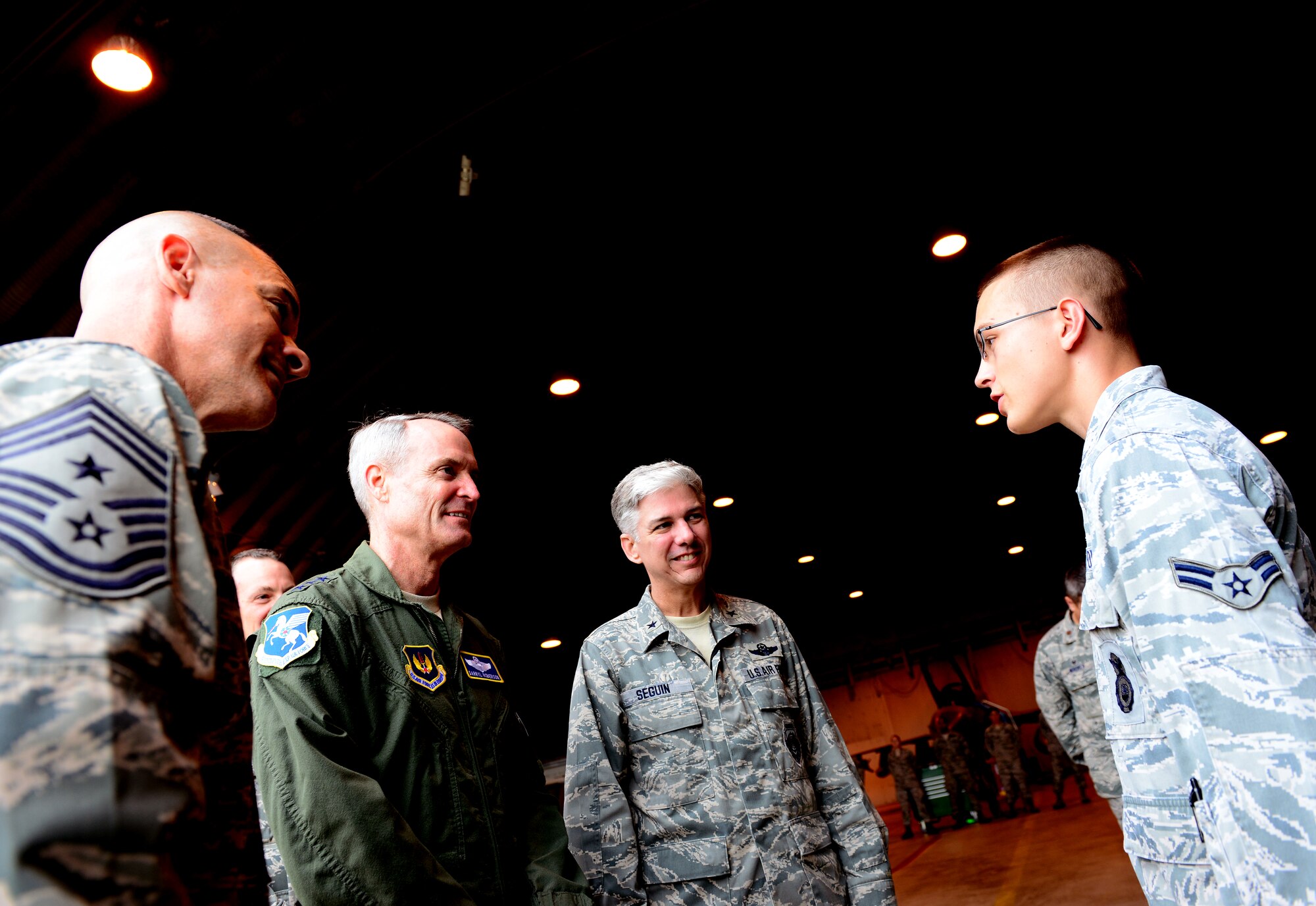Airman 1st Class Zachary Justice, 31st Security Forces Squadron exclusion area entry control, was named the 31st Fighter Wing’s “Wyvern Warrior of the Week,” during a wing tour, Oct. 8, 2014, at Aviano Air Base, Italy. Justice was recognized by Brig. Gen. Barre Seguin, 31st FW commander, for going above and beyond in his dedication to the mission. (U.S. Air Force photo/Senior Airman Matthew Lotz) 
