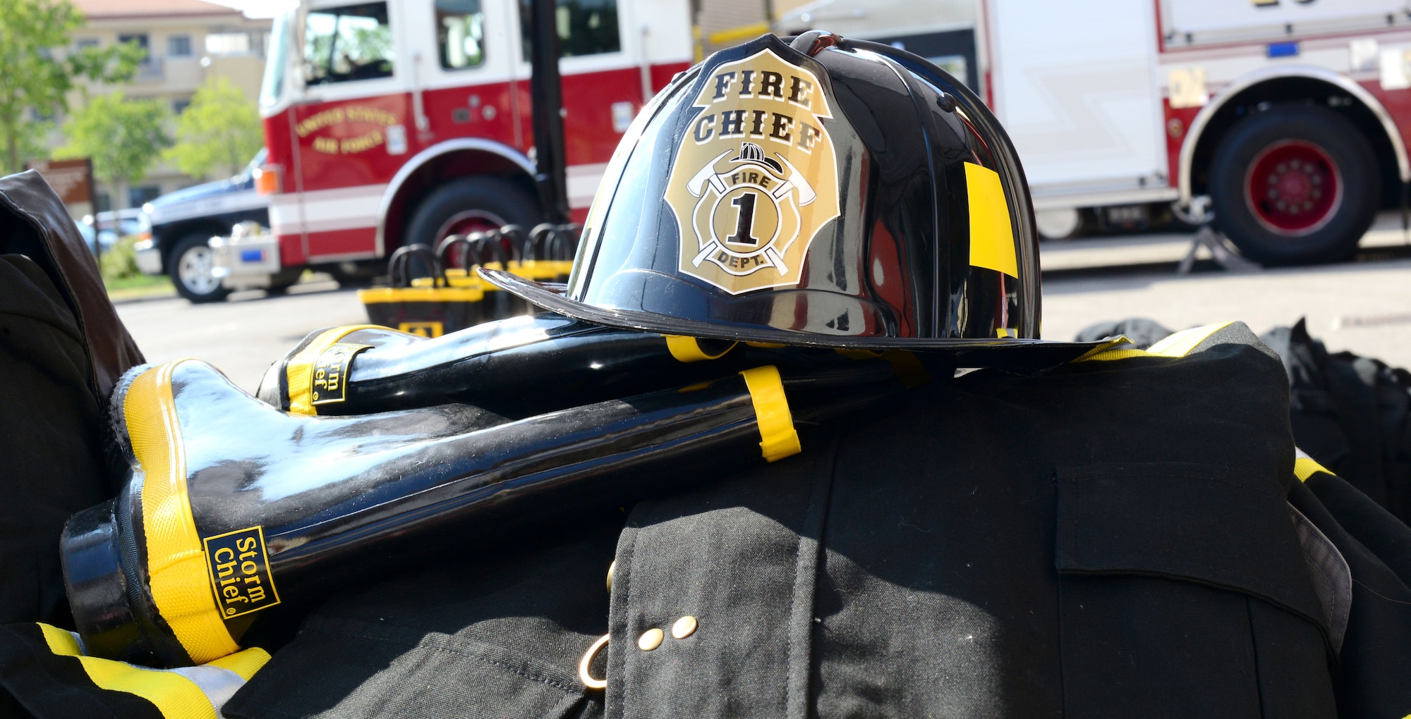 A child-size fireman’s suit sits on a bench during a fire department open house, Oct. 5, 2014, at Aviano Air Base, Italy. In addition to an open house and child development center visit, the Fire Department hosted a library reading and a fire safety demonstration for the elementary school. (U.S. Air Force photo/Senior Airman Michael Battles)
